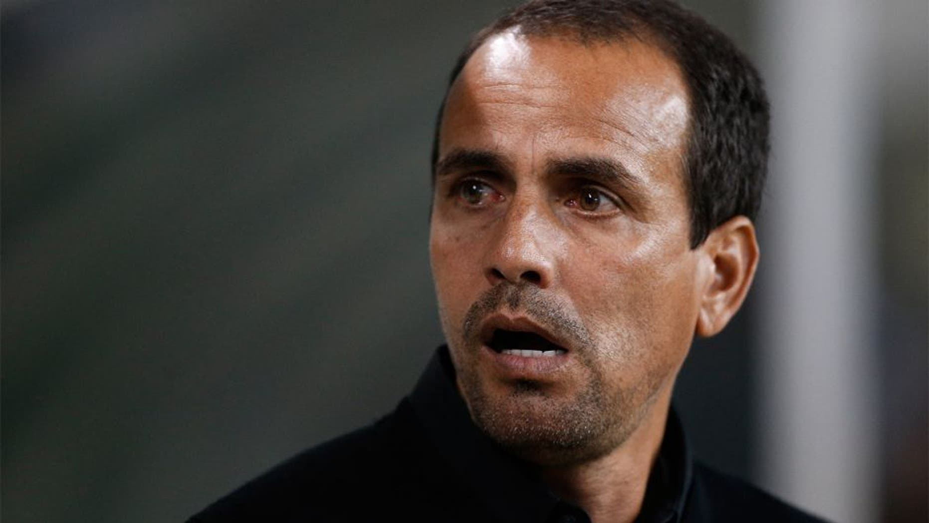 Nov 1, 2015; Seattle, WA, USA; FC Dallas head coach Oscar Pareja looks at the field before the start of a game against the Seattle Sounders FC at CenturyLink Field. Seattle beat Dallas 2-1. Mandatory Credit: Jennifer Buchanan-USA TODAY Sports