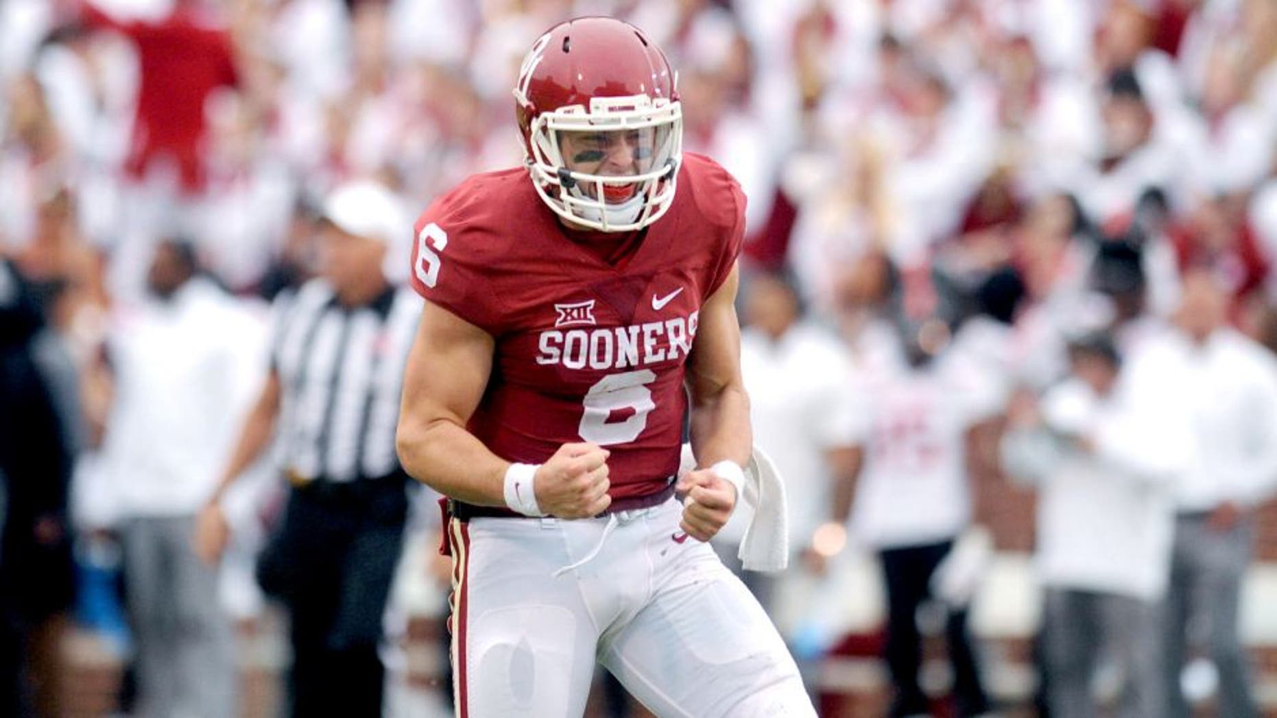 Oct 24, 2015; Norman, OK, USA; Oklahoma Sooners quarterback Baker Mayfield (6) celebrates after a touchdown pass against the Texas Tech Red Raiders during the third quarter at Gaylord Family - Oklahoma Memorial Stadium. Mandatory Credit: Mark D. Smith-USA TODAY Sports