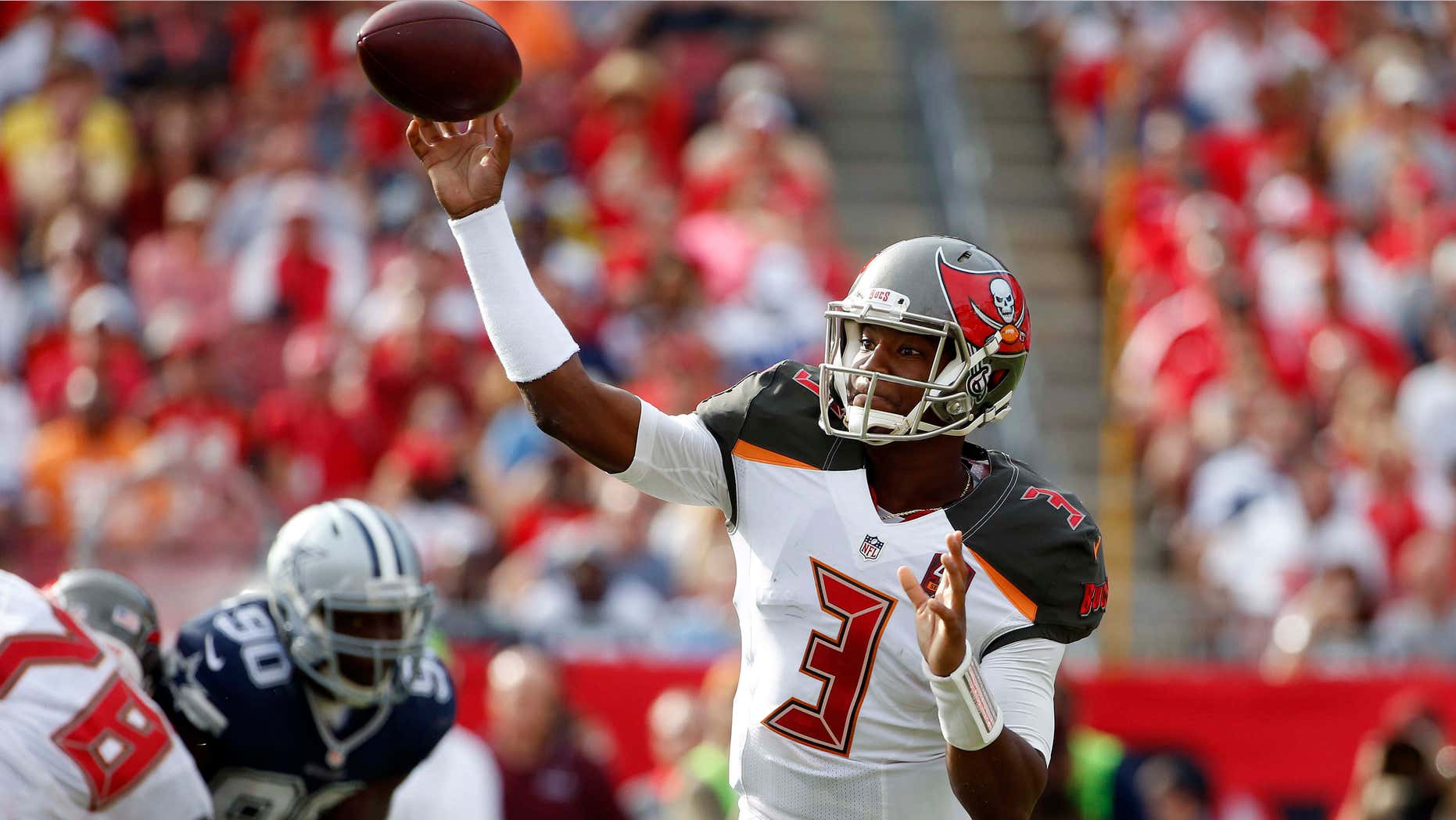 FILE - In this Nov. 15, 2015, file photo, Tampa Bay Buccaneers quarterback Jameis Winston (3) throws a pass against the Dallas Cowboys during the second quarter of an NFL football game, in Tampa, Fla.