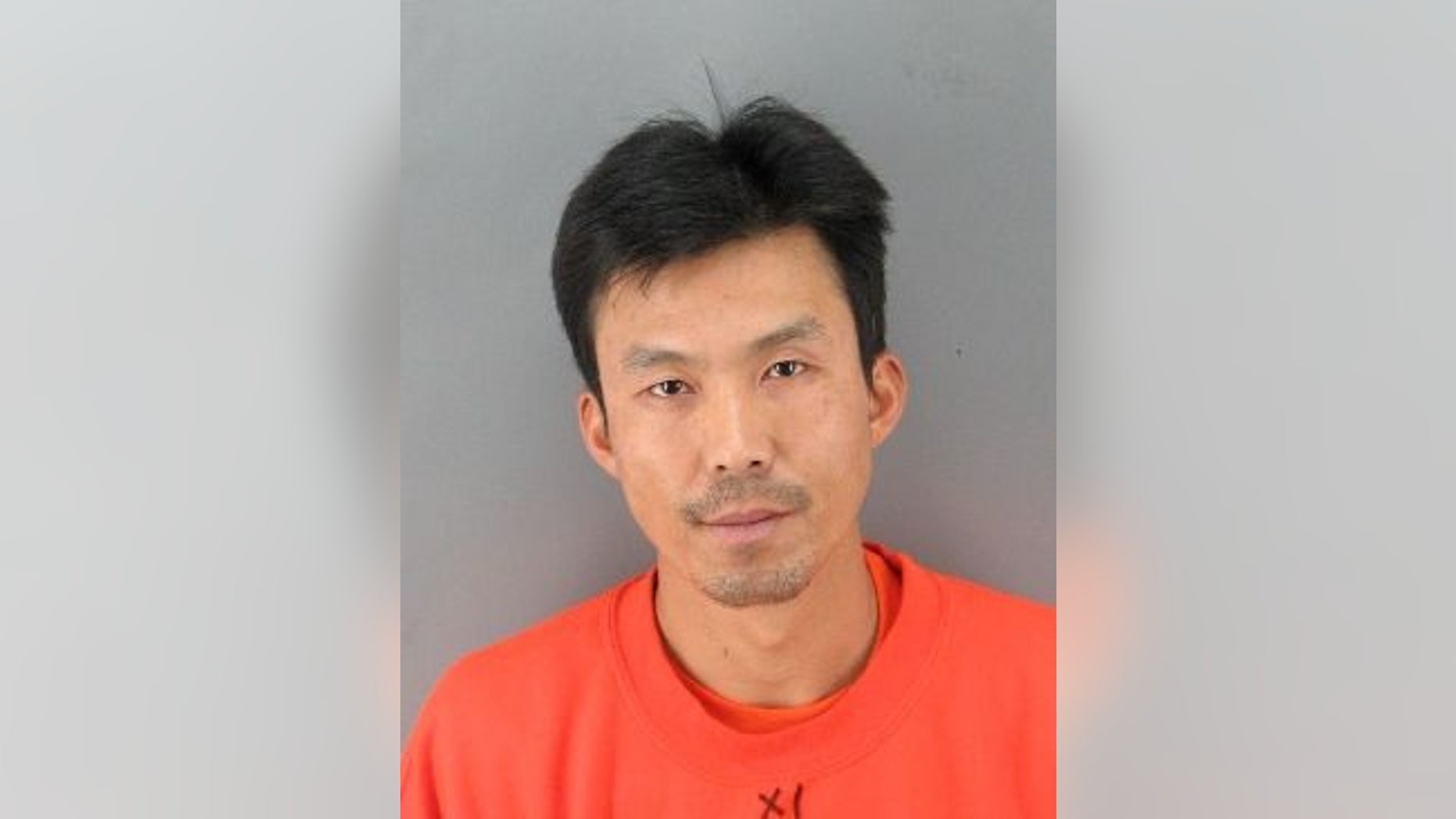 March 25, 2012: Binh Thai Luc after his arrest for the murder of the family of five.