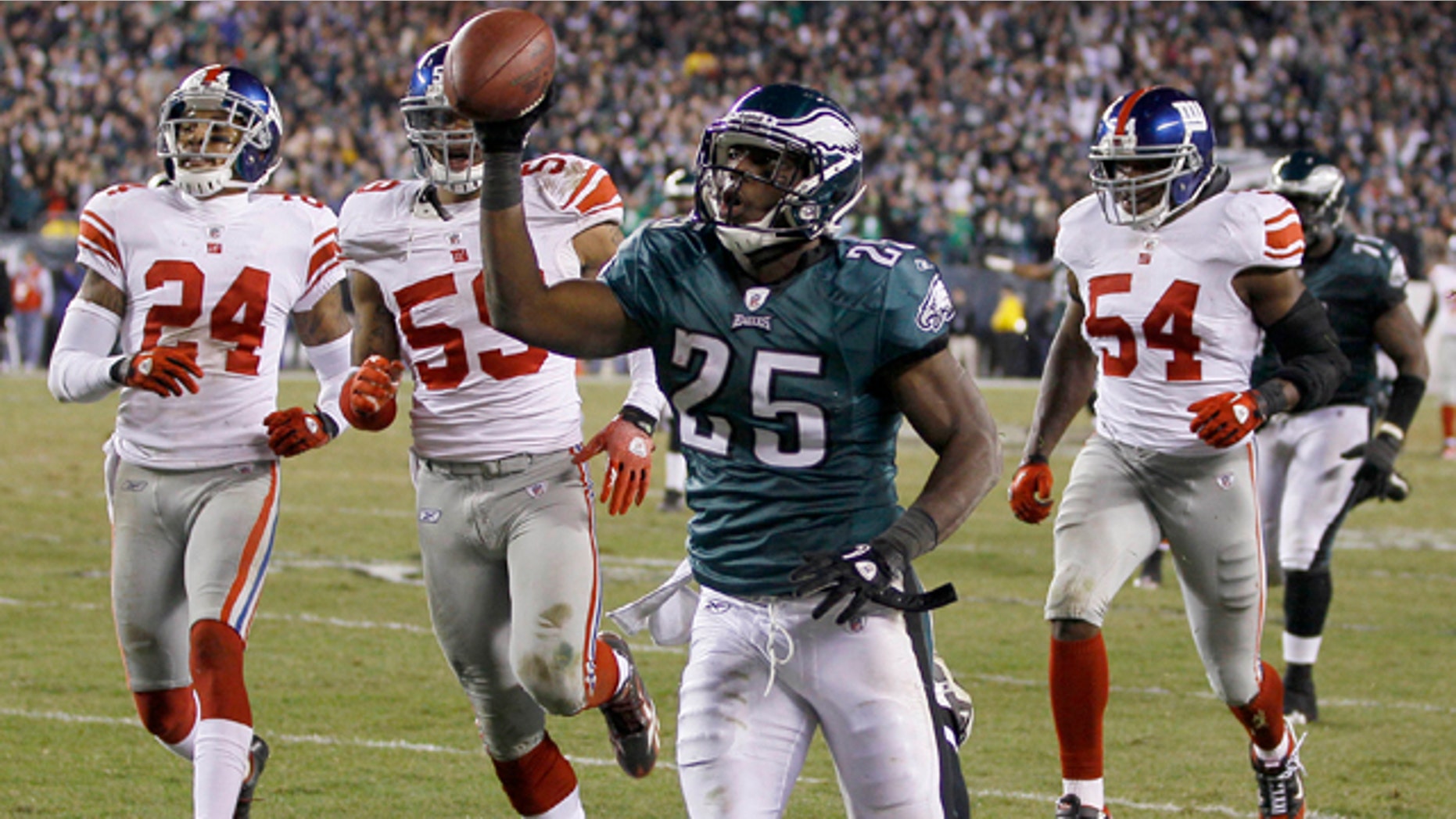 Nov. 21: Philadelphia Eagles running back LeSean McCoy carries the ball to the goal line for a touchdown during the second half of an NFL football game against the New York Giants in Philadelphia.