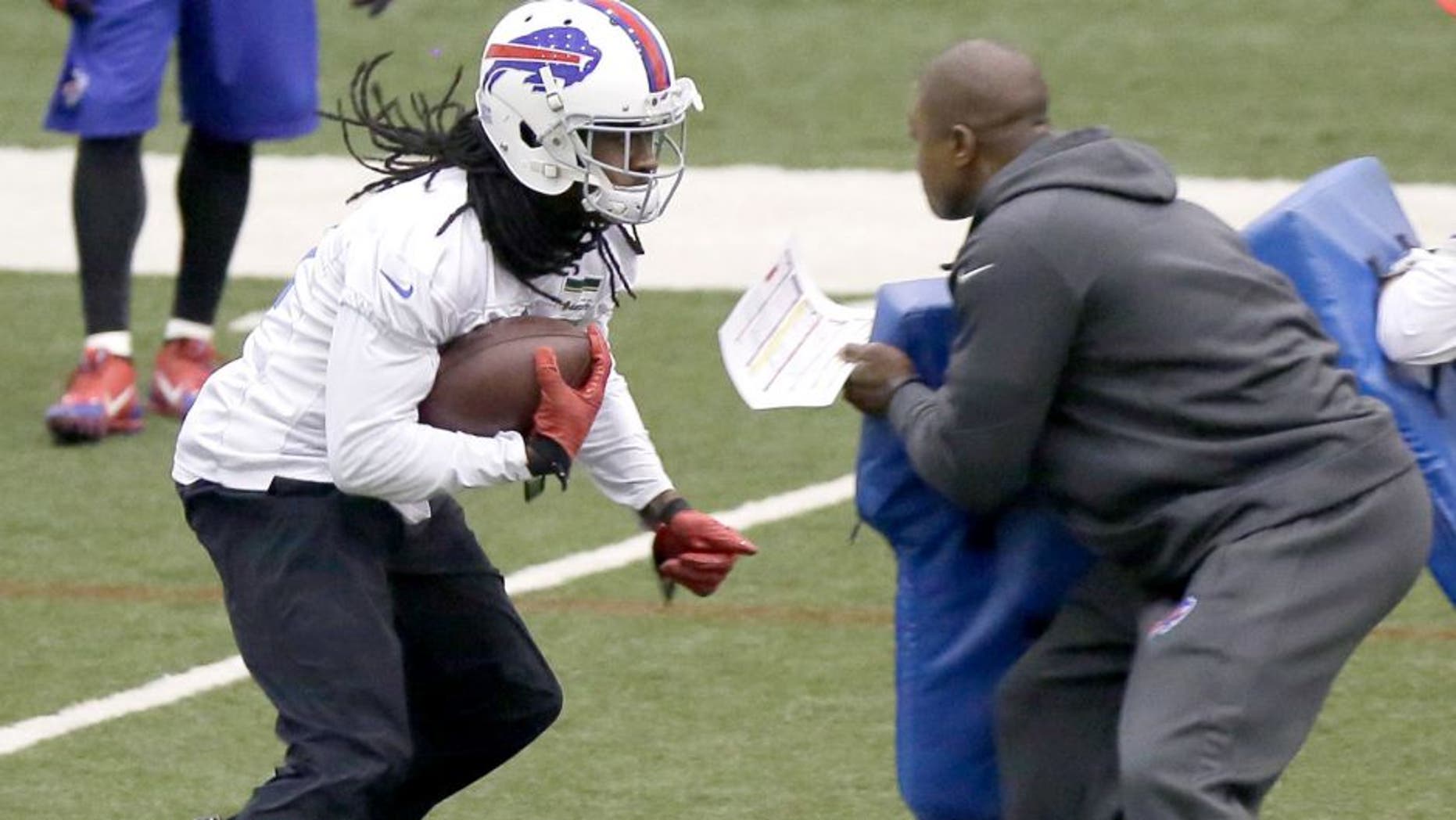 Buffalo Bills wide receiver Sammy Watkins, left, runs a drill during practice at the Detroit Lions' indoor NFL football training facility in Allen Park, Mich., Saturday, Nov. 22, 2014. The Bills are using the facility in preparation for Monday's game against the Jets, which was moved to Detroit because of the snowstorm in Buffalo. (AP Photo/Duane Burleson)