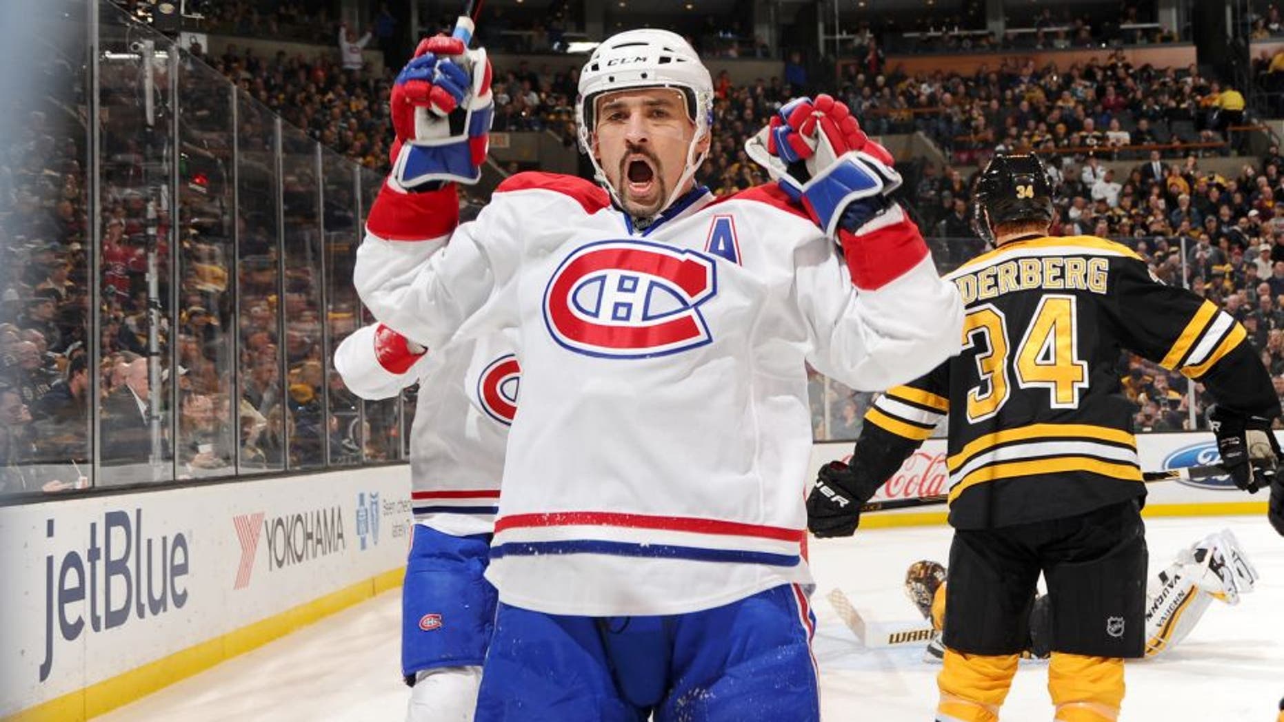 BOSTON, MA - NOVEMBER 22 : Tomas Plekanec #14 of the Montreal Canadiens celebrates a goal against the Boston Bruins at the TD Garden on November 22, 2014 in Boston, Massachusetts. (Photo by Steve Babineau/NHLI via Getty Images)