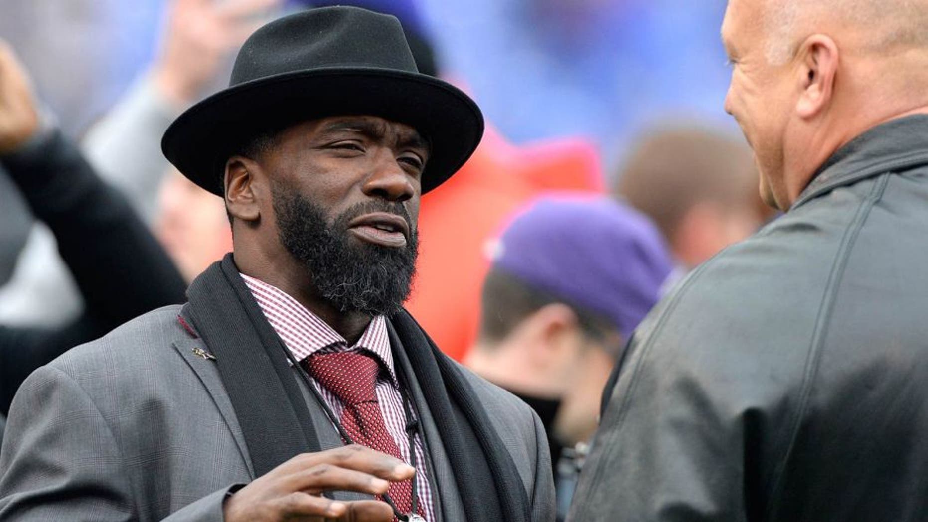 Nov 22, 2015; Baltimore, MD, USA; Former Baltimore Ravens player Ed Reed stands on the field prior to the game against the St. Louis Rams at M&T Bank Stadium. Mandatory Credit: Tommy Gilligan-USA TODAY Sports