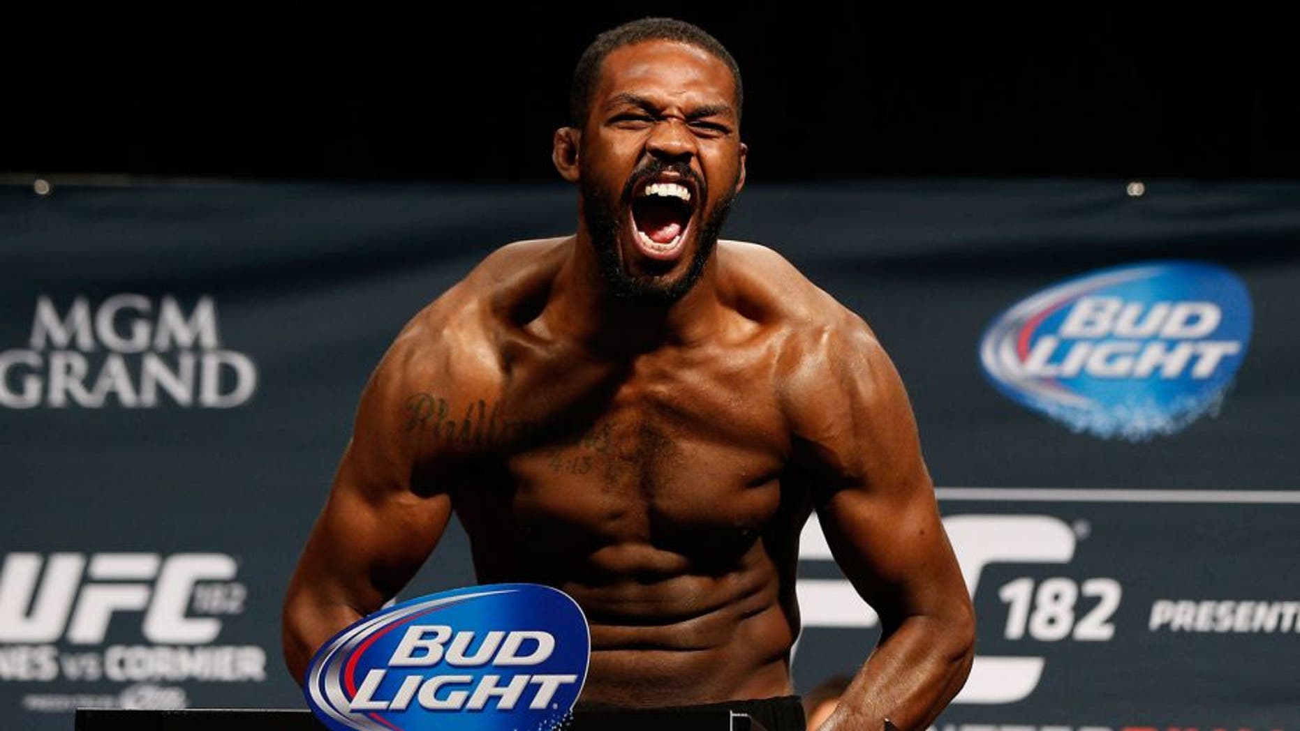 LAS VEGAS, NV - JANUARY 02: UFC light heavyweight champion Jon "Bones" Jones poses on the scale after weighing in during the UFC 182 weigh-in event at the MGM Grand Conference Center on January 2, 2015 in Las Vegas, Nevada. (Photo by Josh Hedges/Zuffa LLC/Zuffa LLC via Getty Images)