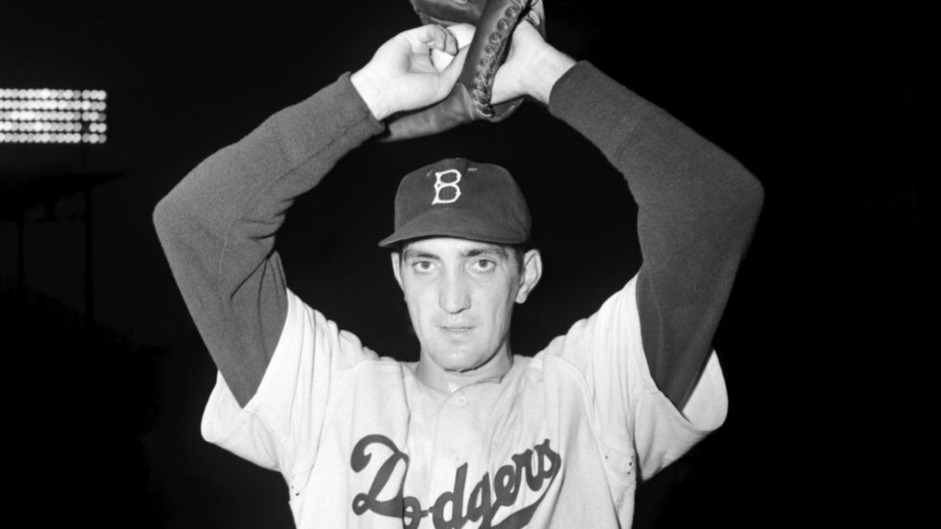 BROOKLYN, NY - 1952: Pitcher Ralph Branca, of the Brooklyn Dodgers, poses for a portrait prior to a game in 1952 at Ebbets Field in Brooklyn, New York. Branca says he's not superstitious, but changed his uniform number from "13" to "12" this season after he surrended the pennant-clinching home run to Bobby Thomson of the New York Giants in the bottom of the ninth inning in the final game of the playoff series to decide the 1951 National League pennant. Ralph Branca5201 Kidwiler Collection/Diamond Images®