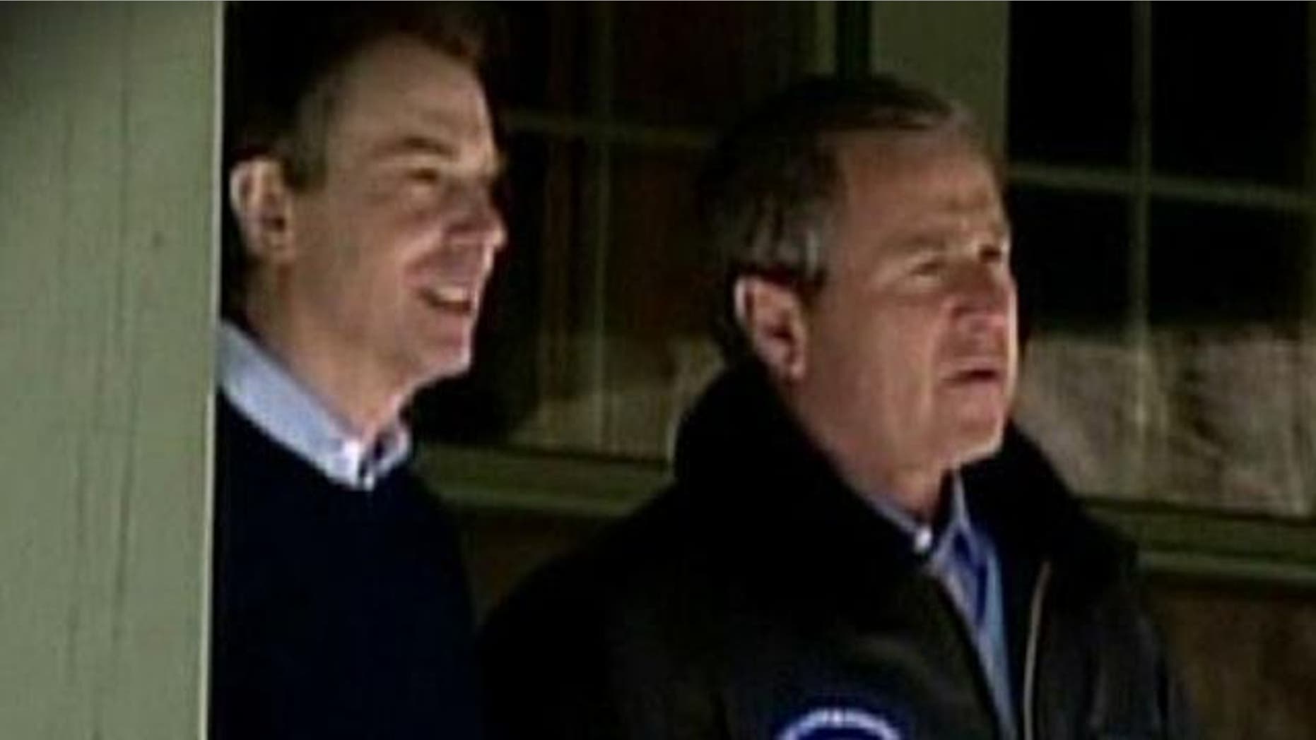 Former British Prime Minister Tony Blair and Former U.S. President George W. Bush