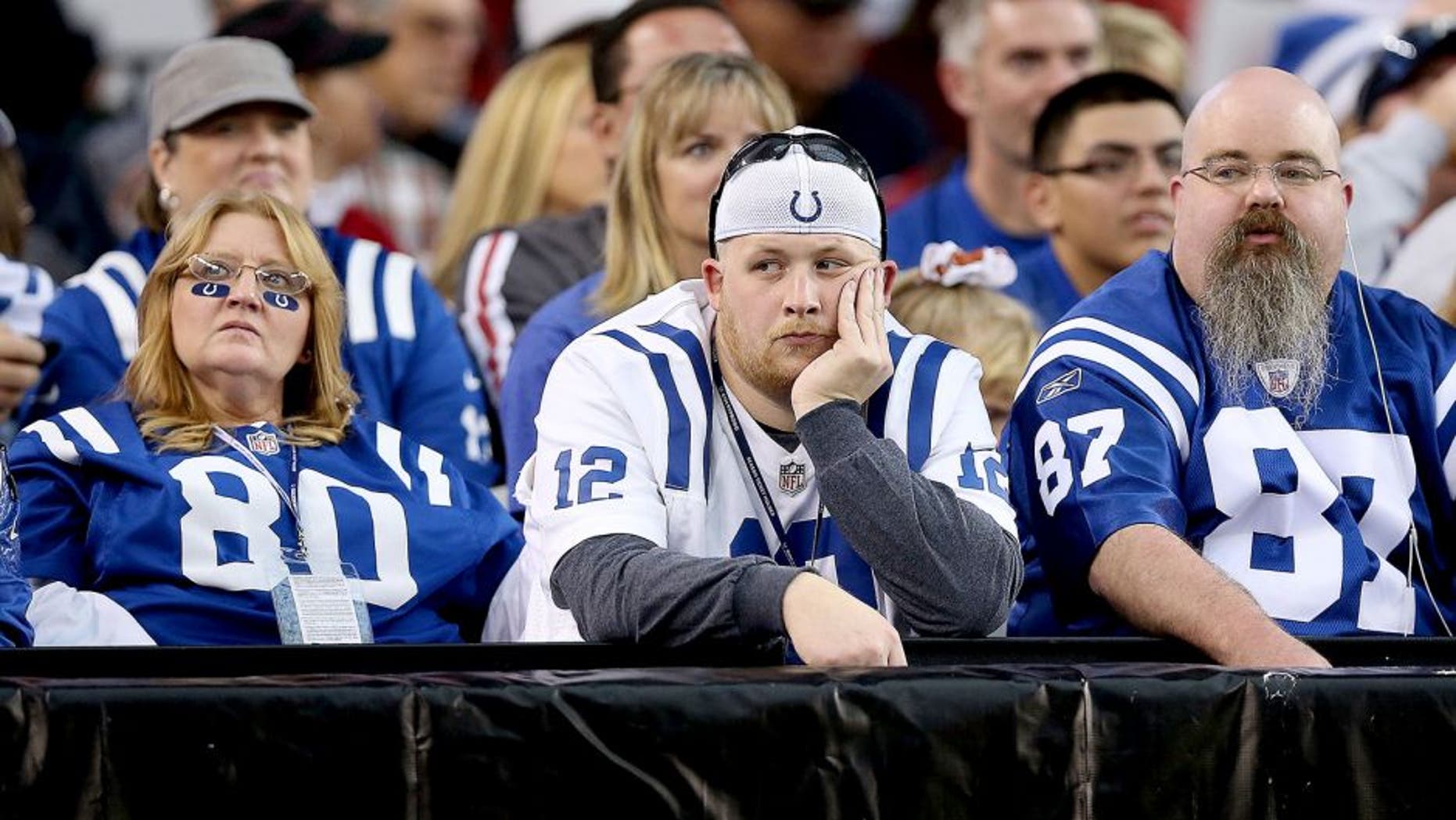 GLENDALE, AZ - NOVEMBER 24: Fans of the Indianapolis Colts react during the NFL game against the Arizona Cardinals at the University of Phoenix Stadium on November 24, 2013 in Glendale, Arizona. (Photo by Christian Petersen/Getty Images)