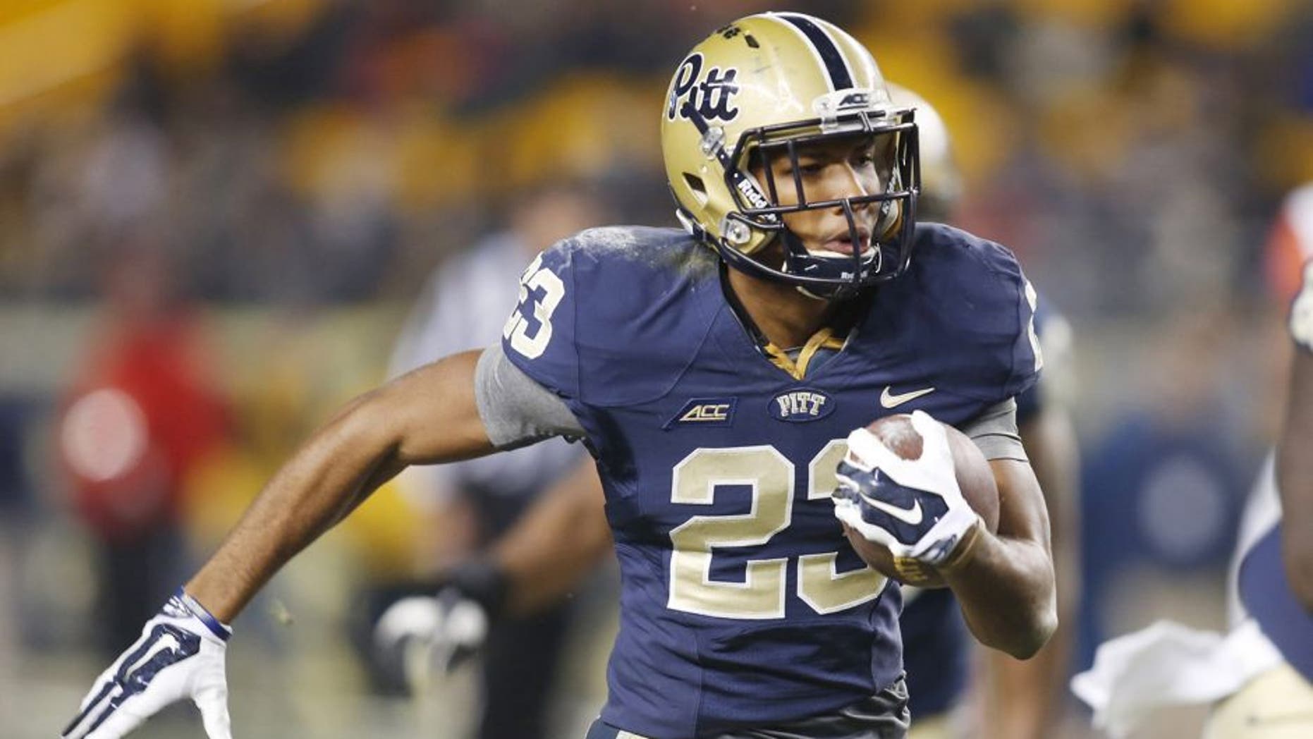 Nov 22, 2014; Pittsburgh, PA, USA; Pittsburgh Panthers wide receiver Tyler Boyd (23) runs on a forty-nine yard touchdown reception against the Syracuse Orange during the fourth quarter at Heinz Field. Pittsburgh won 30-7. Mandatory Credit: Charles LeClaire-USA TODAY Sports