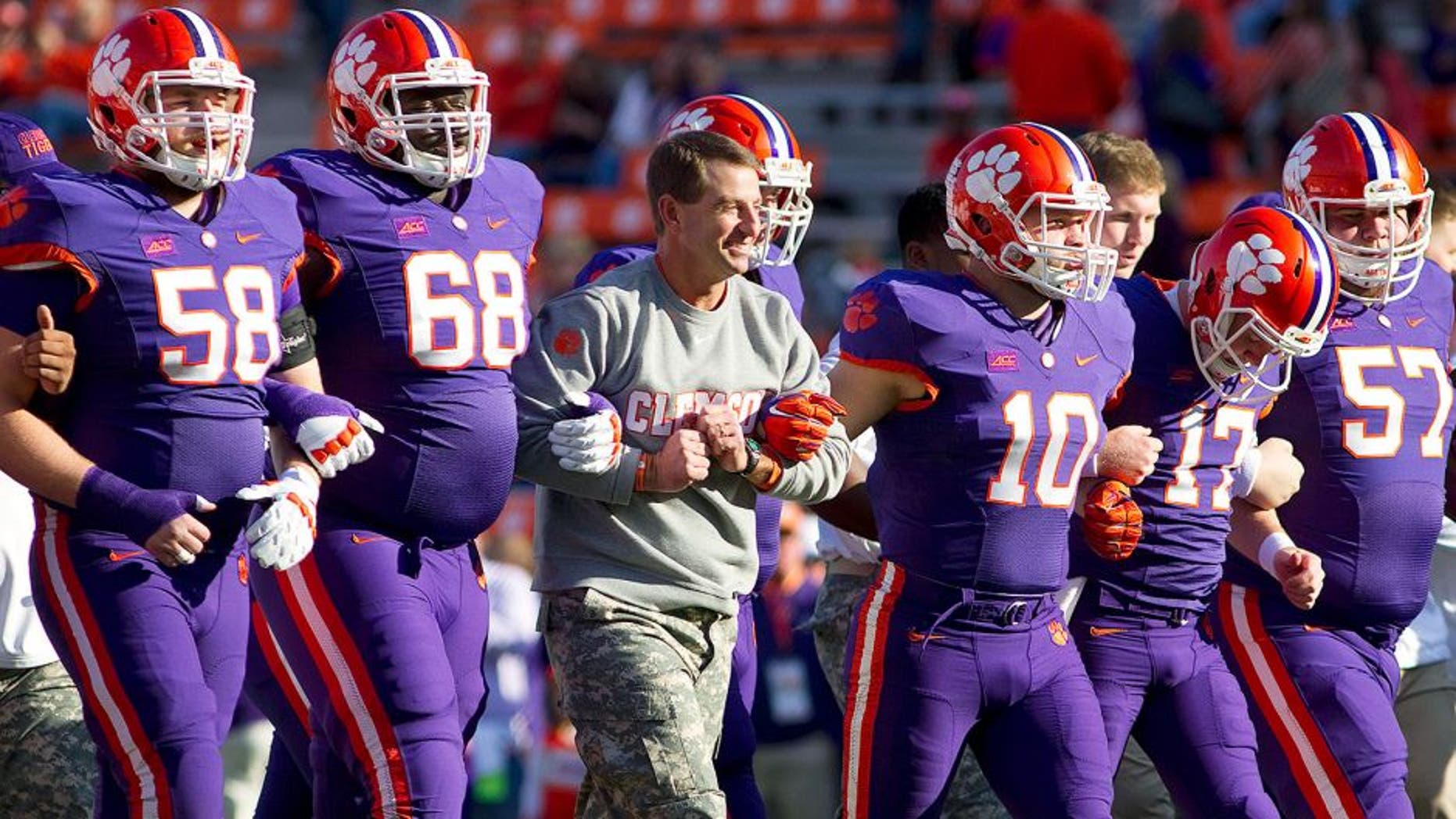 Nov 22, 2014; Clemson, SC, USA; Clemson Tigers head coach Dabo Swinney (center) prior to the game against the Georgia State Panthers at Clemson Memorial Stadium. Mandatory Credit: Joshua S. Kelly-USA TODAY Sports