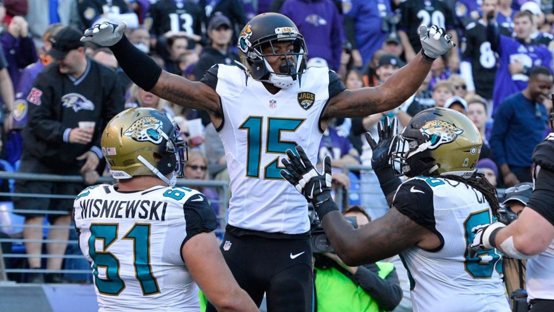 Nov 15, 2015; Baltimore, MD, USA; Jacksonville Jaguars wide receiver Allen Robinson (15) celebrates with teammates after catching a touchdown pass during the fourth quarter against the Baltimore Ravens at M&T Bank Stadium. Mandatory Credit: Tommy Gilligan-USA TODAY Sports