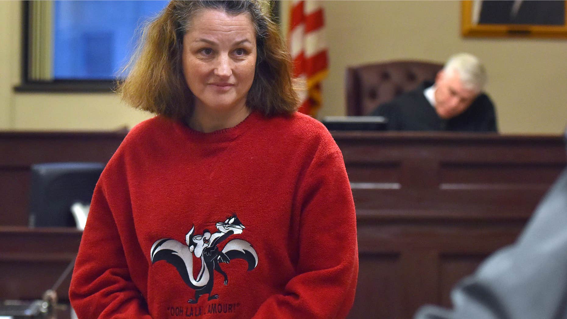 Nov. 24, 2015: Traci Irwin leaves an indictment hearing at the Oneida County Courthouse in Utica.