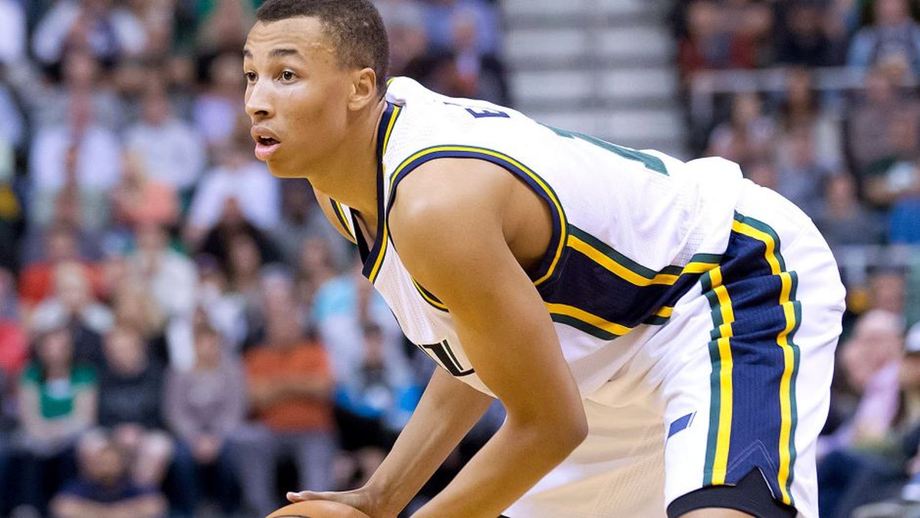 Nov 5, 2014; Salt Lake City, UT, USA; Utah Jazz guard Dante Exum (11) controls the ball during the first half against the Cleveland Cavaliers at EnergySolutions Arena. Mandatory Credit: Russ Isabella-USA TODAY Sports
