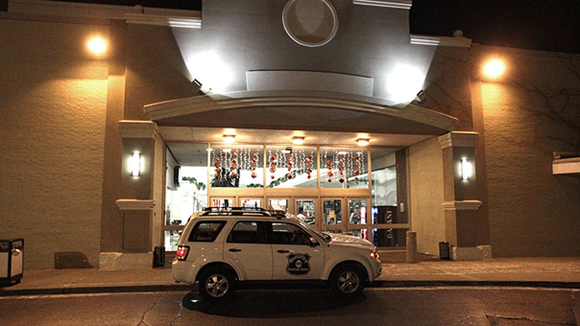 Nov. 27: A security vehicle sits parked outside the entrance to Eastland Mall in Harper Woods, Mich.