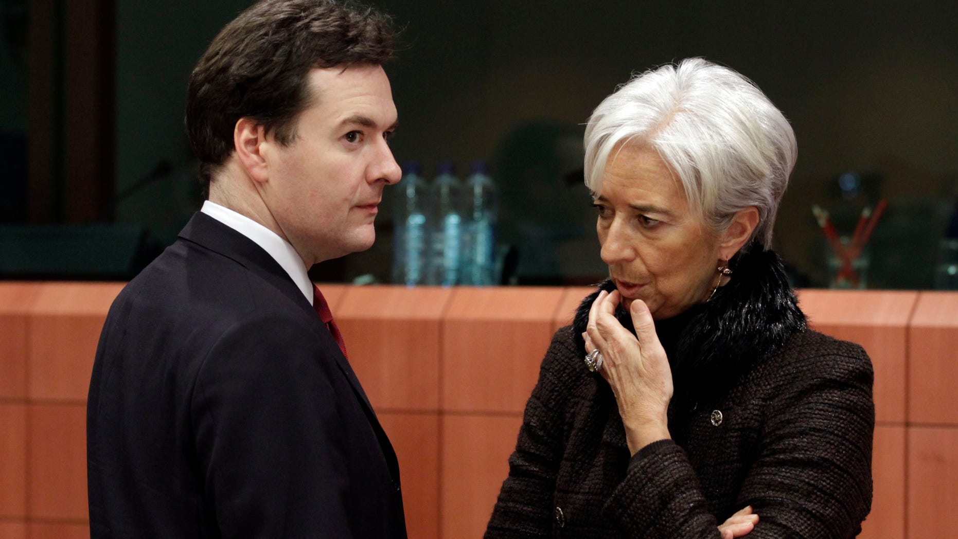 Nov. 28: French Finance Minister Christine Lagarde, right, shares a word with British Chancellor of the Exchequer George Osborne during a round table of eurozone finance ministers at the EU Council building in Brussels.