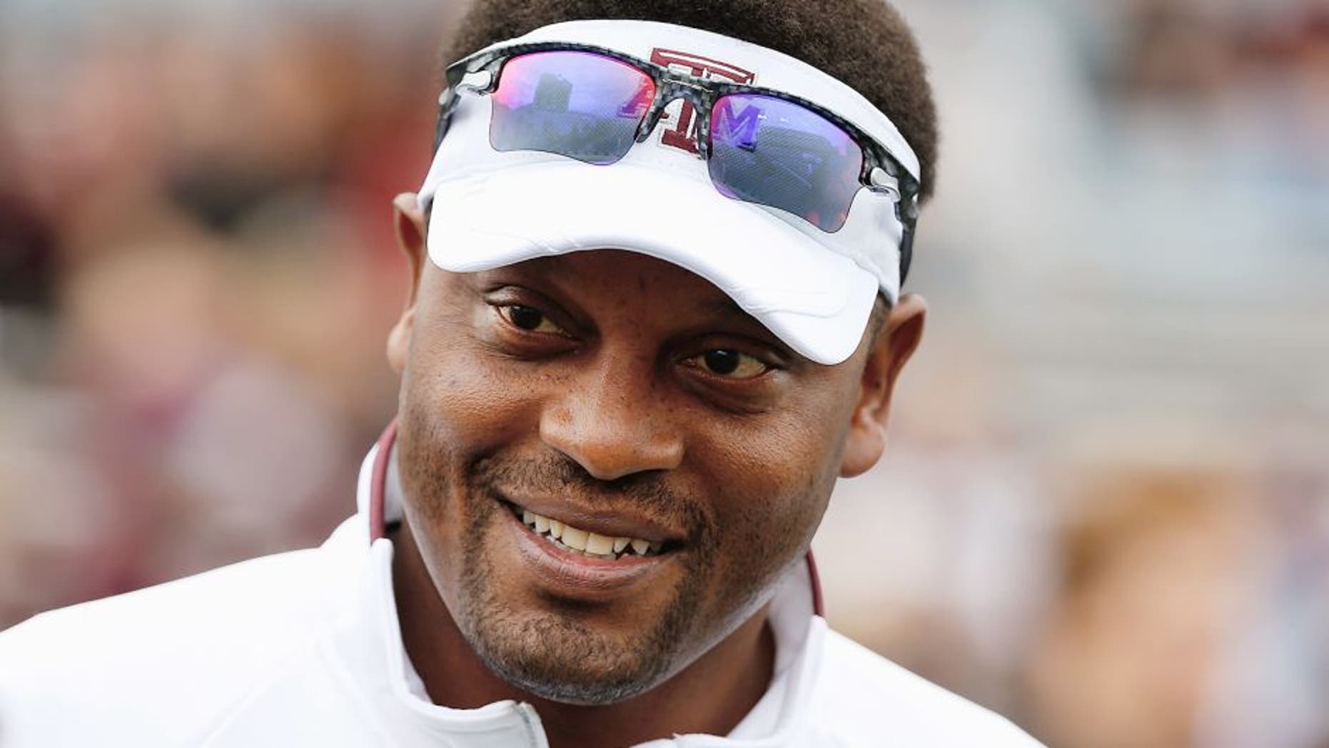 COLLEGE STATION, TX - NOVEMBER 09: Head coach Kevin Sumlin of the Texas A&M Aggies waits on the field before the game against the Mississippi State Bulldogs at Kyle Field on November 9, 2013 in College Station, Texas. (Photo by Scott Halleran/Getty Images)