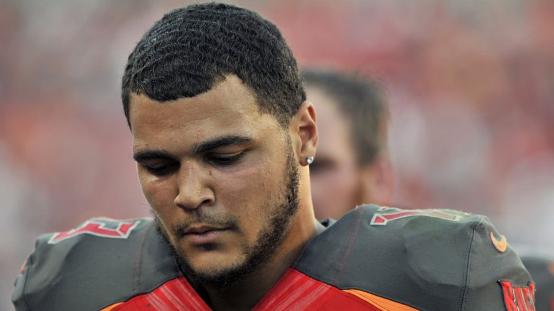 Tampa Bay Buccaneers wide receiver Mike Evans (13) leaves the field following the team's 14-13 loss to the Cincinnati Bengals during an NFL football game Sunday, Nov. 30, 2014, in Tampa, Fla. (AP Photo/Steve Nesius)