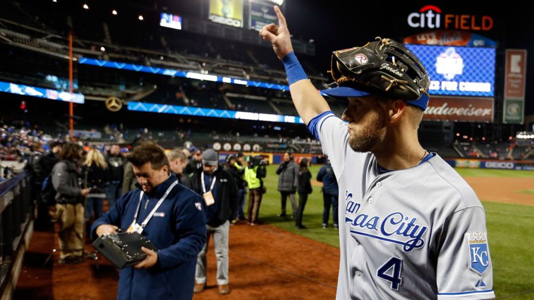 NEW YORK, NY - OCTOBER 31: Alex Gordon #4 of the Kansas City Royals celebrates after defeating the New York Mets by a score of 5-3 to win Game Four of the 2015 World Series at Citi Field on October 31, 2015 in the Flushing neighborhood of the Queens borough of New York City. (Photo by Sean M. Haffey/Getty Images)