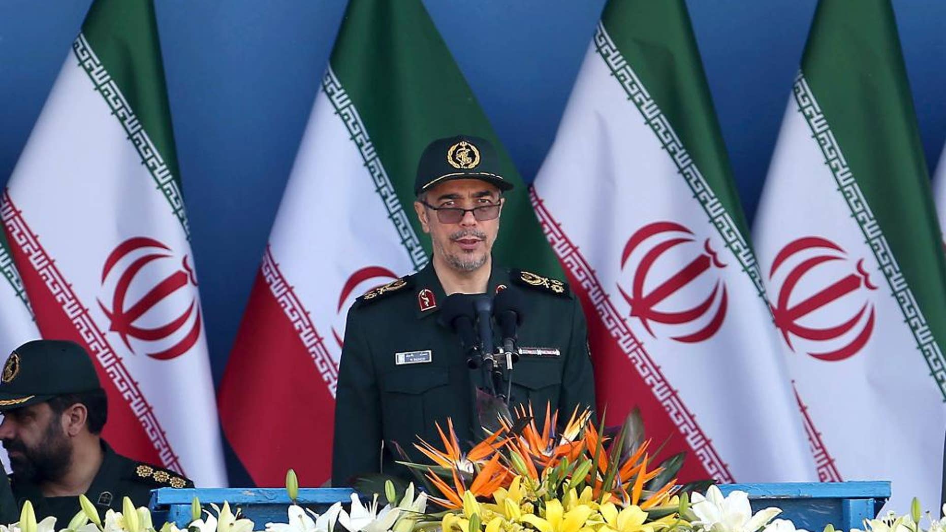 FILE -- In this Sept. 21, 2016 file photo, Chief of Staff of Iran's Armed Forces, General Mohammad Hossein Bagheri delivers a speech during a military parade marking the 36th anniversary of Iraq's 1980 invasion of Iran, in front of the shrine of late revolutionary founder Ayatollah Khomeini, just outside Tehran, Iran. State television on Monday, May 8, 2017, quoted Bagheri as saying soldiers will attack terrorists wherever they are, suggesting they could go over the border into Pakistan to target militants there. The report comes after an attack claimed by the Sunni militant group Jaish-ul-Adl killed 10 soldiers in April. (AP Photo/Ebrahim Noroozi, File)