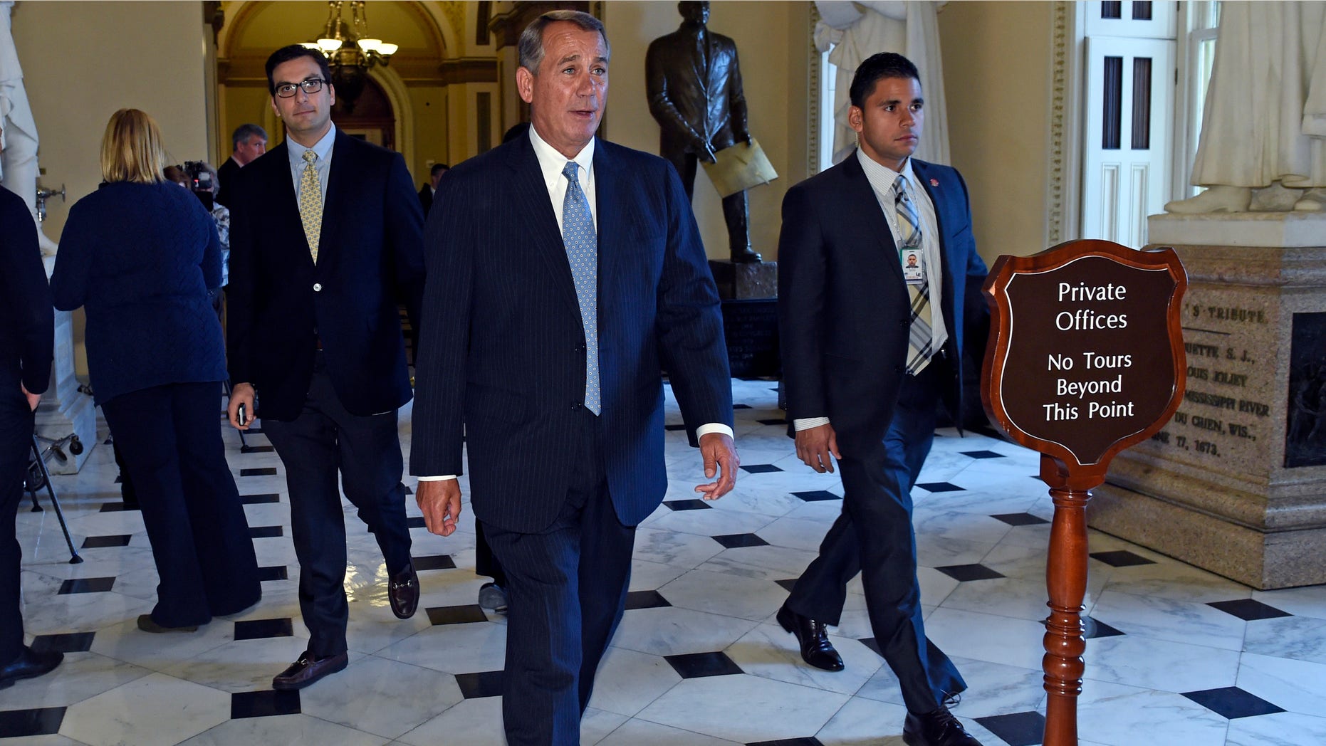 House Speaker John Boehner of Ohio walks back to his office on Capitol, Wednesday, Jan. 14, 2015.