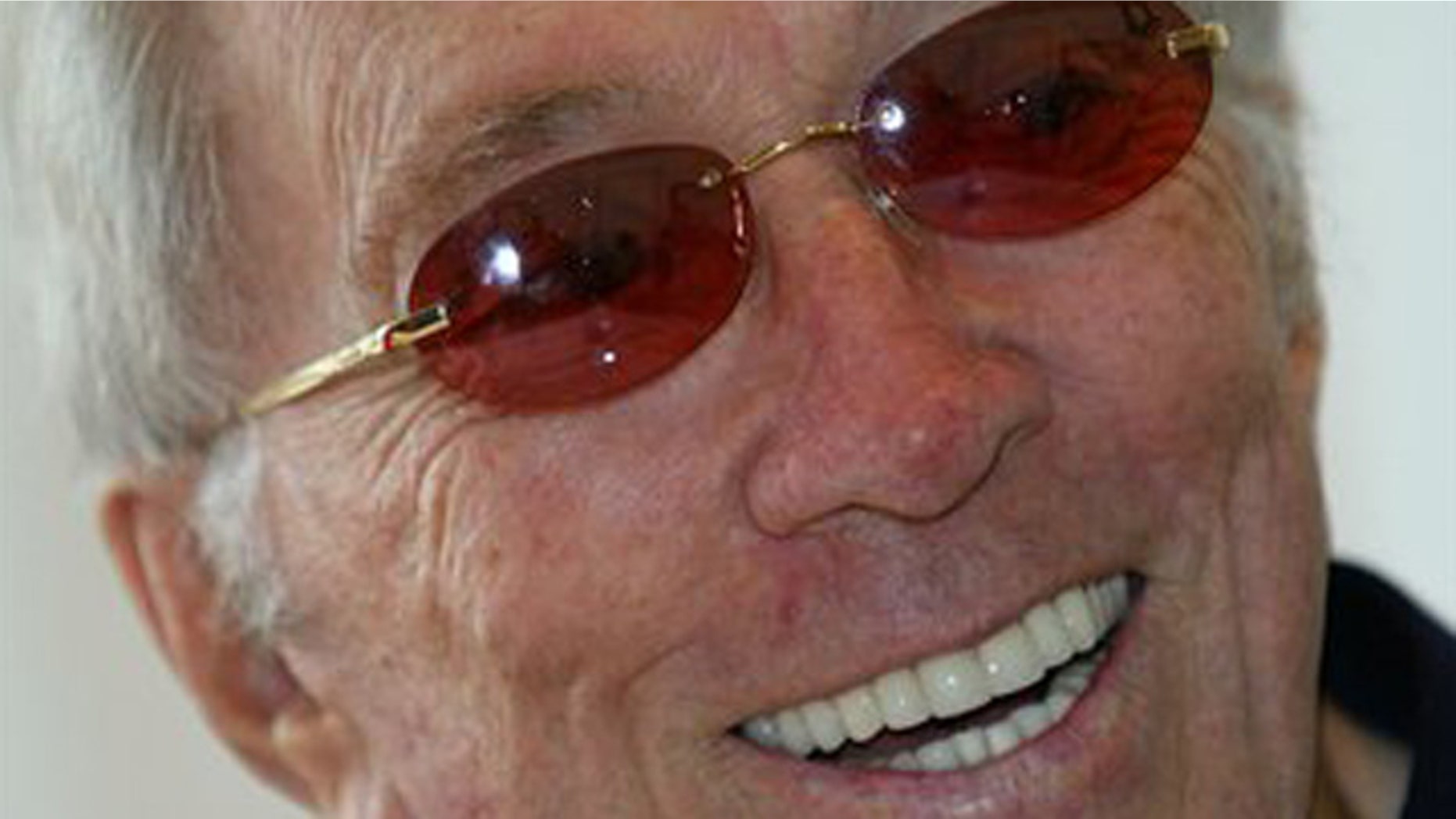FILE - U.S. singer Andy Williams smiles as he speaks to reporters during his news conference at a Tokyo hotel.