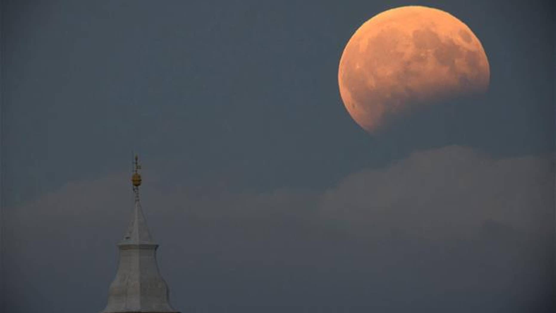 This Aug. 7, 2017 photo shows the partial lunar eclipse photographed from Tiszafoldvar, Hungary.