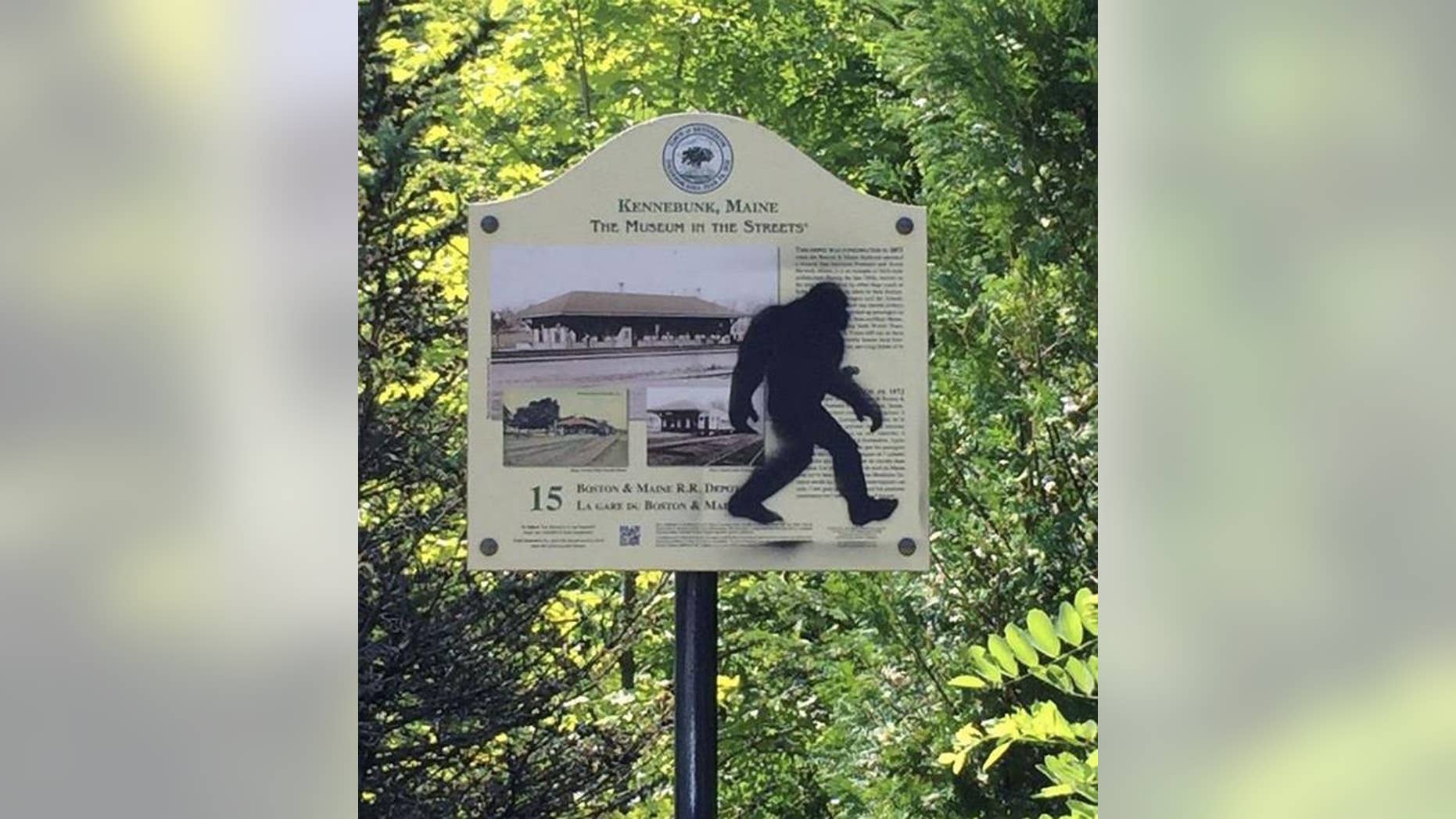 This photo provided by the Kennebunk Police Department shows graffiti on a sign in Kennebunk, Maine. A prankster spray-painted Bigfoot on town signs.