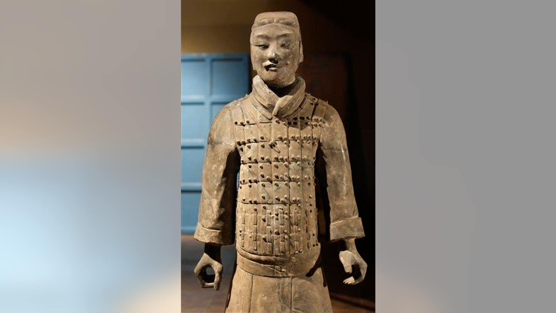 A terra cotta statue is unpacked for the exhibition "Terra Cotta Warriors: Guardians of China's First Emperor," at the Bowers Museum in Santa Ana, Calif., in this file photo.