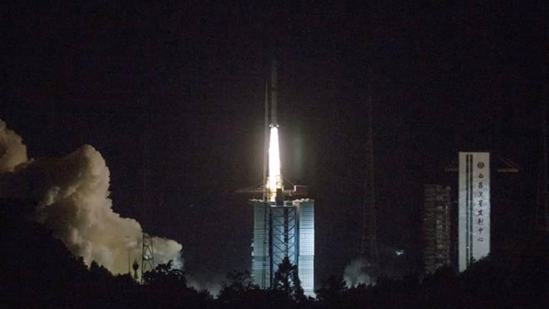 In this photo, a Long March 4C rocket carrying the Queqiao ("Magpie Bridge") satellite is launched from southwest China's Xichang Satellite Launch Center on Monday.