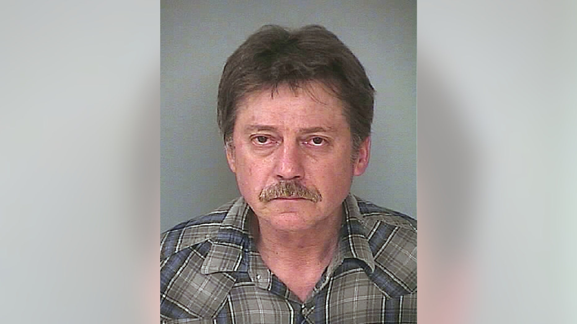 In this photo provided by Washington County, Md., Sheriff's Office, Edward Clarence Schneider is shown in a police booking photo March 15, 2016, in Hagerstown, Md. The California truck driver has been sentenced to 15 years in prison for shooting up a Hagerstown, Maryland, hotel room, sending bullets into nearby rooms, while he was high on crystal meth. (Washington County, Md., Sheriff’s Office via AP.)