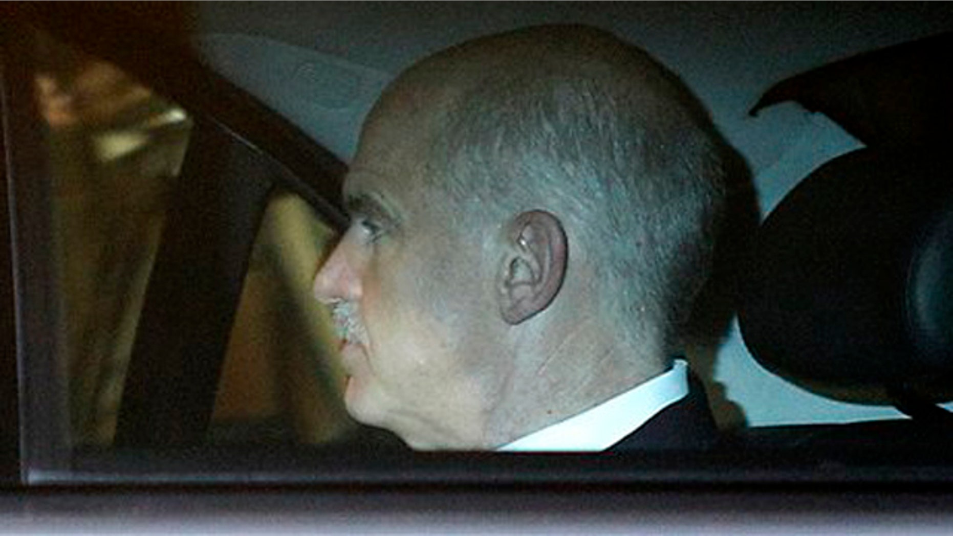 November 9, 2011: Greek Prime Minister George Papandreou travels by car as he leaves the presidential palace after a meeting with Greek President Karolos Papoulias and various other political leaders in Athens.