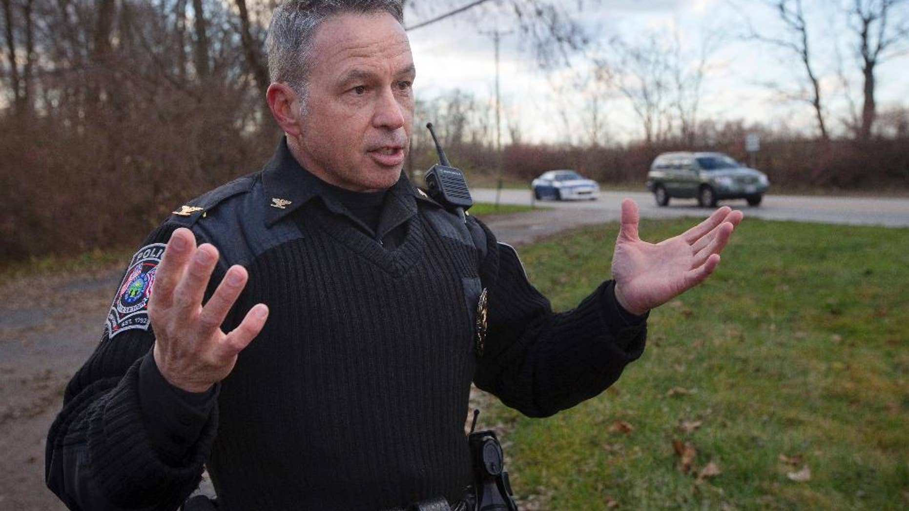 FILE – In this Dec. 18, 2015 file photo, the chief of police of the Newtown, Ohio, Police Department, Thomas Synan Jr., speaks to reporters at the scene of a traffic stop arrest in Newtown, Ohio. Synan Jr., who heads the Hamilton County Drug Coalition task force, said drug overdoses in the Cincinnati area dropped to 10 to 15 a day during the last weekend of August 2016, following a weeklong spike that exhausted emergency workers in the Cincinnati area and the neighboring states of Indiana, Kentucky and West Virginia. (AP Photo/John Minchillo, File)