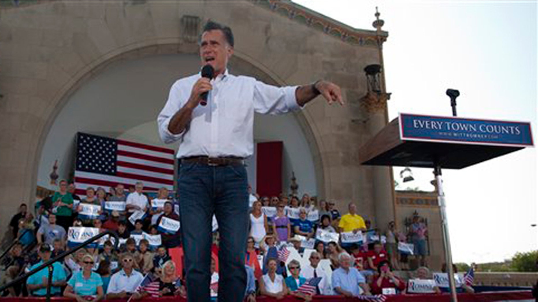 Republican presidential candidate Mitt Romney gestures during a campaign stop in Davenport, Iowa.