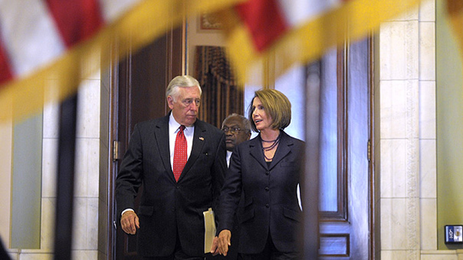 Nov. 17: House Majority Leader Steny Hoyer and Speaker Nancy Pelosi walk to a news conference on Capitol Hill.