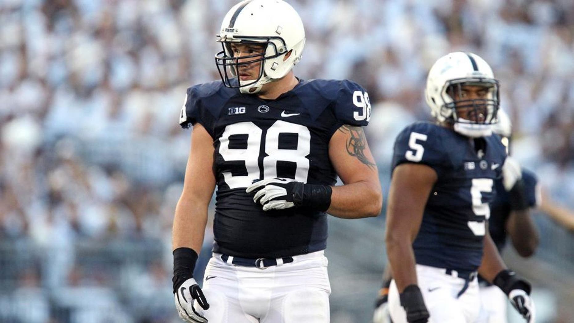 Oct 12, 2013; University Park, PA, USA; Penn State Nittany Lions defensive end Anthony Zettel (98) during the second quarter against the Michigan Wolverines at Beaver Stadium. Penn State defeated Michigan 43-40 in overtime. Mandatory Credit: Matthew O'Haren-USA TODAY Sports