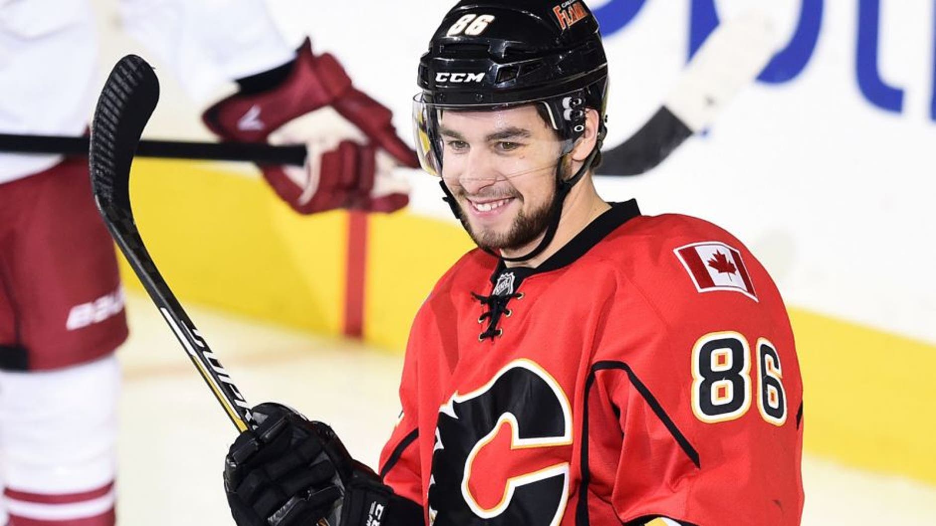 Dec 2, 2014; Calgary, Alberta, CAN; Calgary Flames center Josh Jooris (86) celebrates his second period goal against Arizona Coyotes during the second period at Scotiabank Saddledome. Mandatory Credit: Candice Ward-USA TODAY Sports