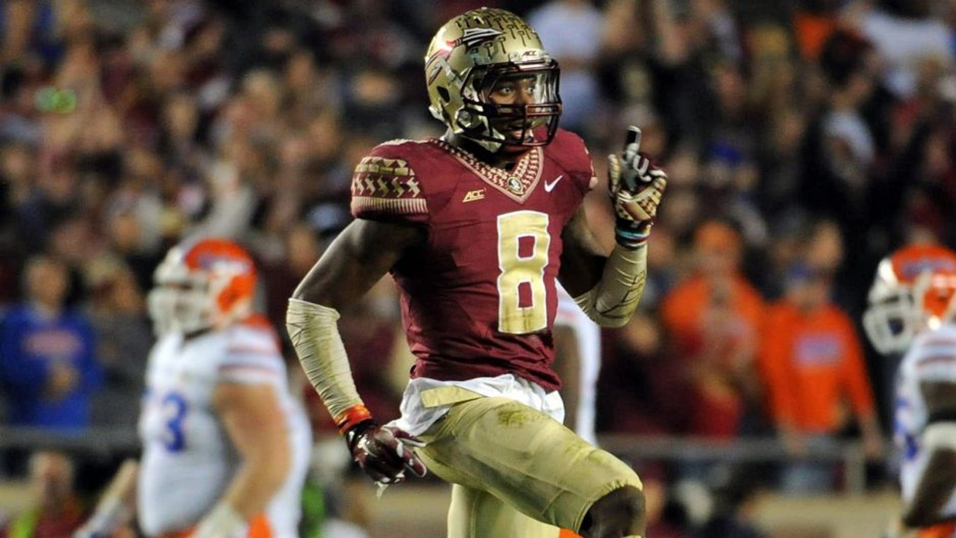 Nov 29, 2014; Tallahassee, FL, USA; Florida State Seminoles defensive back Jalen Ramsey (8) celebrates during the game against the Florida Gators at Doak Campbell Stadium. Mandatory Credit: Melina Vastola-USA TODAY Sports