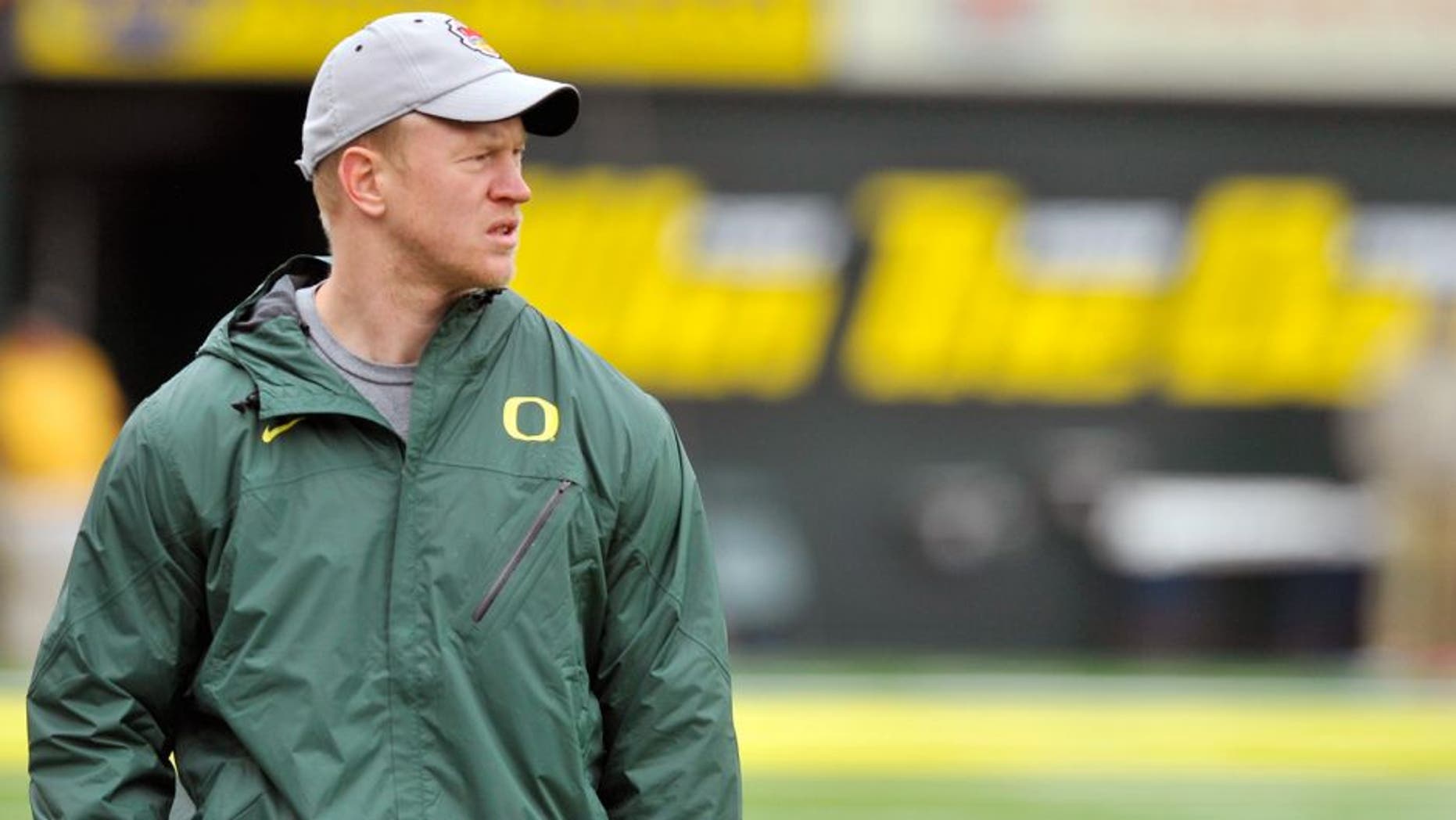 Assistant coach/wide receivers Scott Frost of the Oregon Ducks watches the Ducks during their scrimmage at Autzen Stadium on April 13, 2011 in Eugene, Oregon. (Photo by Steve Dykes/Getty Images)