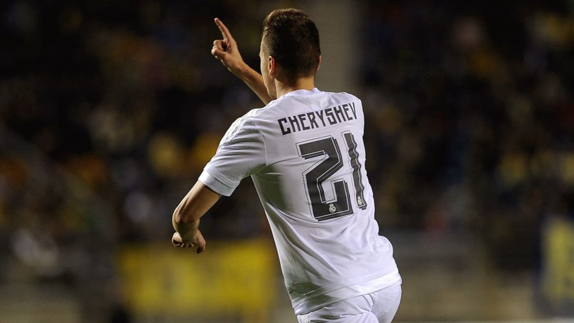Real Madrid's Russian midfielder Denis Cheryshev celebrates after scoring during the Spanish Copa del Rey (King's Cup) football match Cadiz CF vs Real Madrid at the Ramon de Carranza in Cadiz on December 2, 2015. AFP PHOTO / CRISTINA QUICLER / AFP / CRISTINA QUICLER (Photo credit should read CRISTINA QUICLER/AFP/Getty Images)