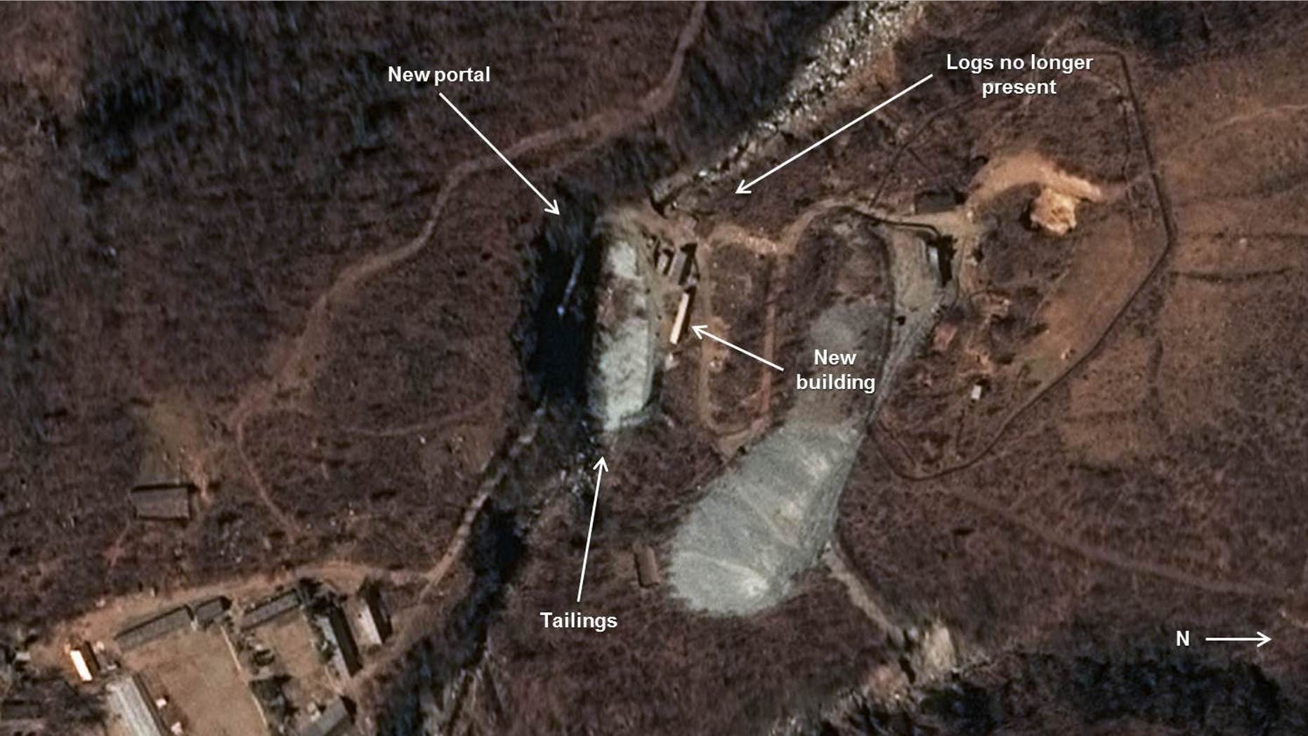 Oct. 25, 2015: This image provided by the U.S.-Korea Institute at the Johns Hopkins School of Advanced International Studies via 38 North and via a satellite image from Centre National d’Études Spatiales and Airbus Defense & Space, shows a satellite image of what appears to be a new tunnel under mountains where North Korea conducts nuclear test explosions.