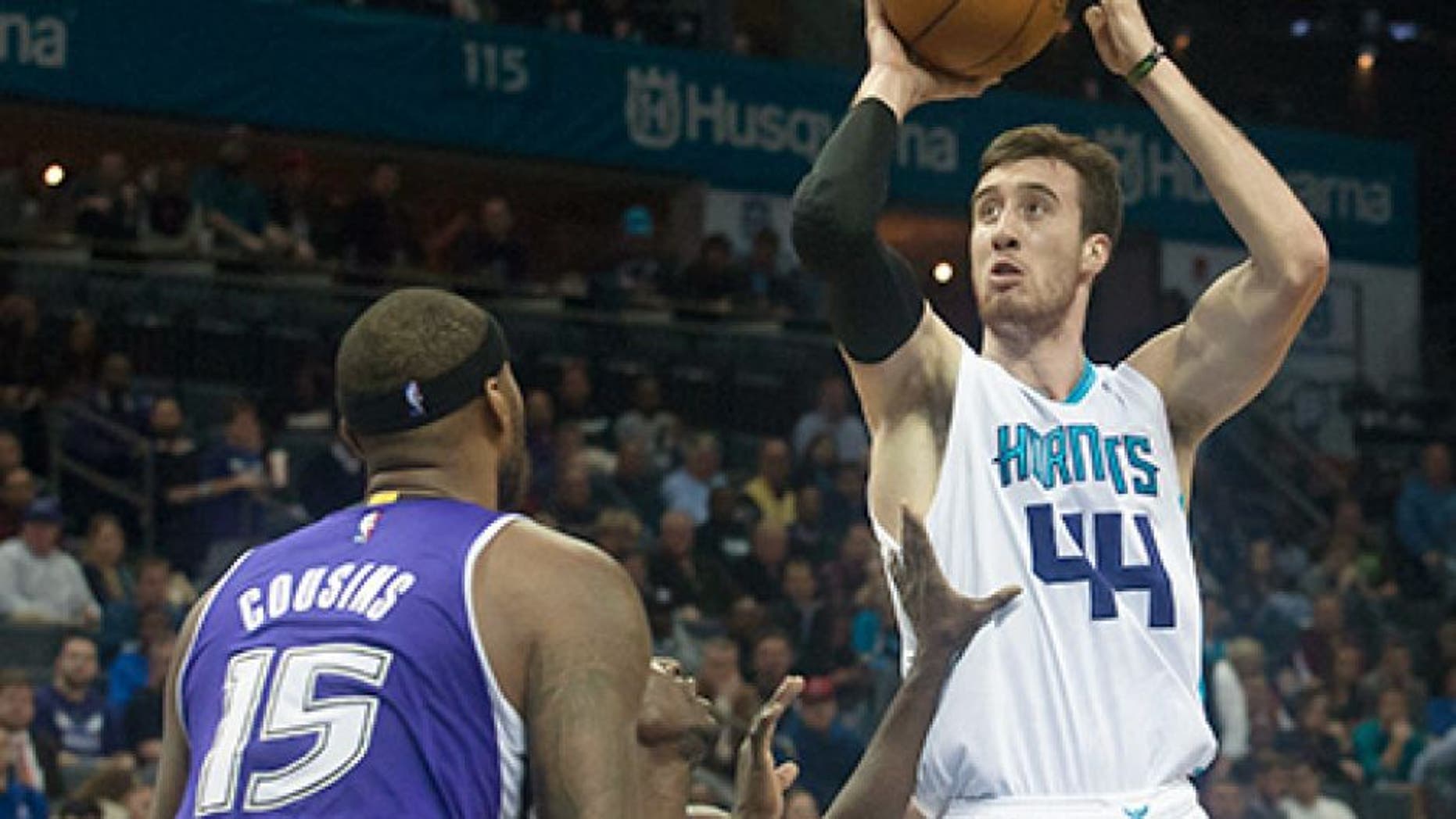 Nov 23, 2015; Charlotte, NC, USA; Charlotte Hornets center Frank Kaminsky III (44) goes up for a shot over Sacramento Kings guard Darren Collison (7) during the second half at Time Warner Cable Arena. The Hornets defeated the Kings 127-122 in OT. Mandatory Credit: Jeremy Brevard-USA TODAY Sports