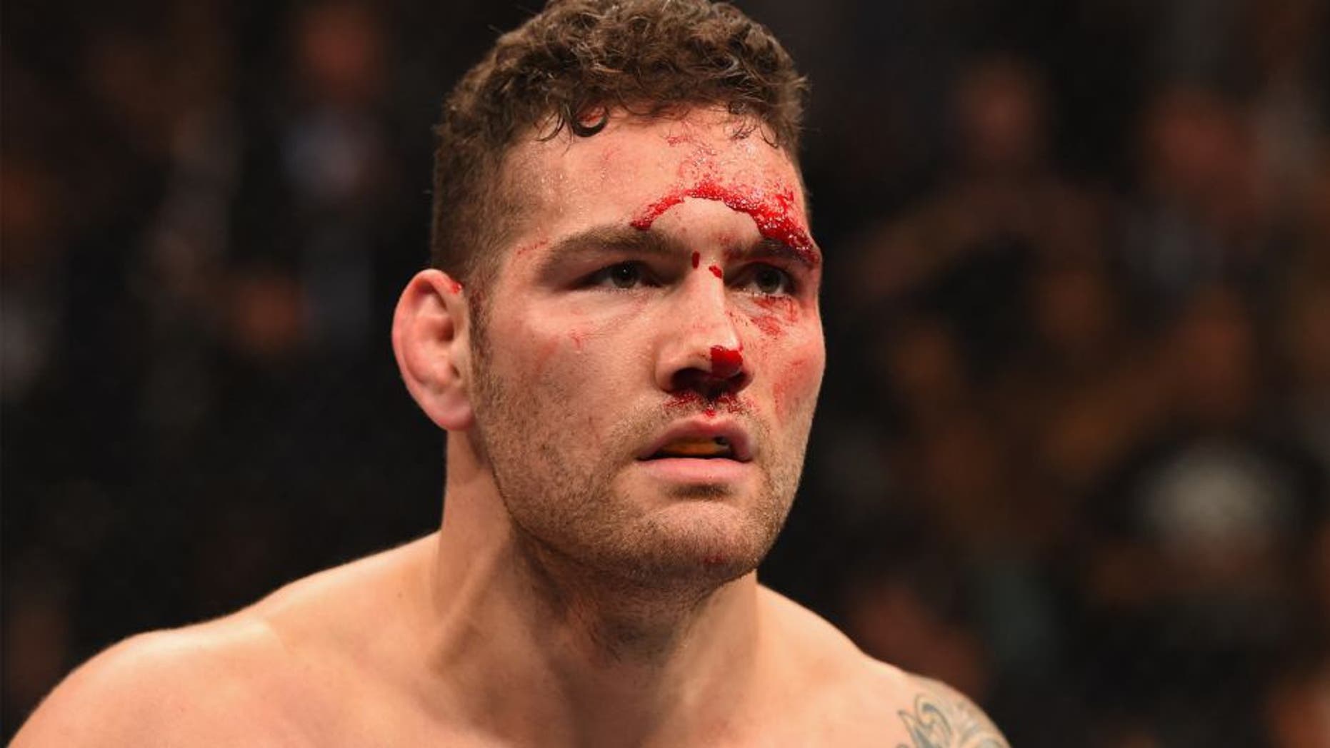 LAS VEGAS, NV - MAY 23: Chris Weidman reacts to his victory over Vitor Belfort of Brazil in their UFC middleweight championship bout during the UFC 187 event at the MGM Grand Garden Arena on May 23, 2015 in Las Vegas, Nevada. (Photo by Josh Hedges/Zuffa LLC/Zuffa LLC via Getty Images)