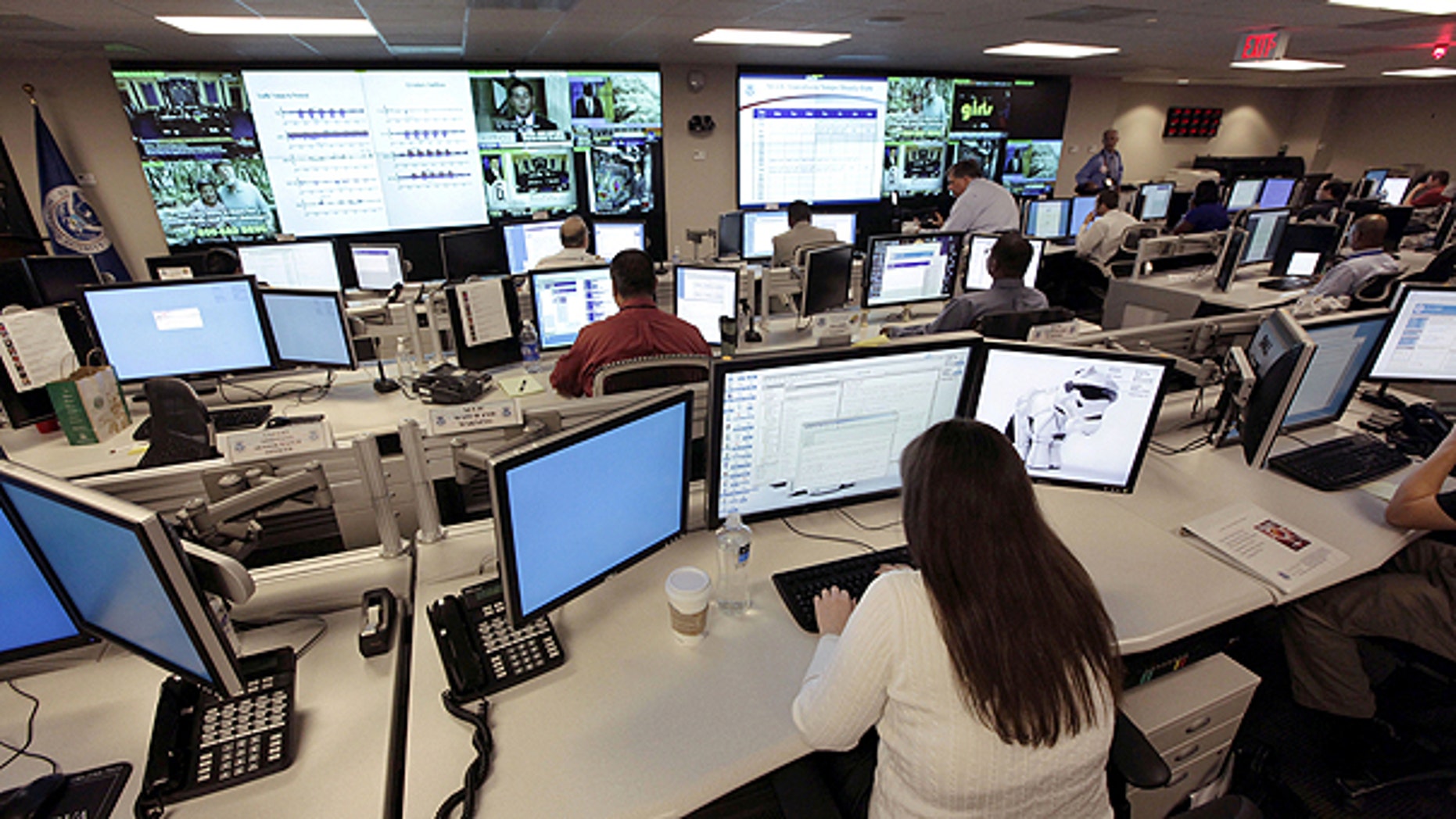 In this Sept. 24, 2010, file photo the National Cybersecurity & Communications Integration Center (NCCIC) prepares for the Cyber Storm III exercise at its operations center in Arlington, Va.