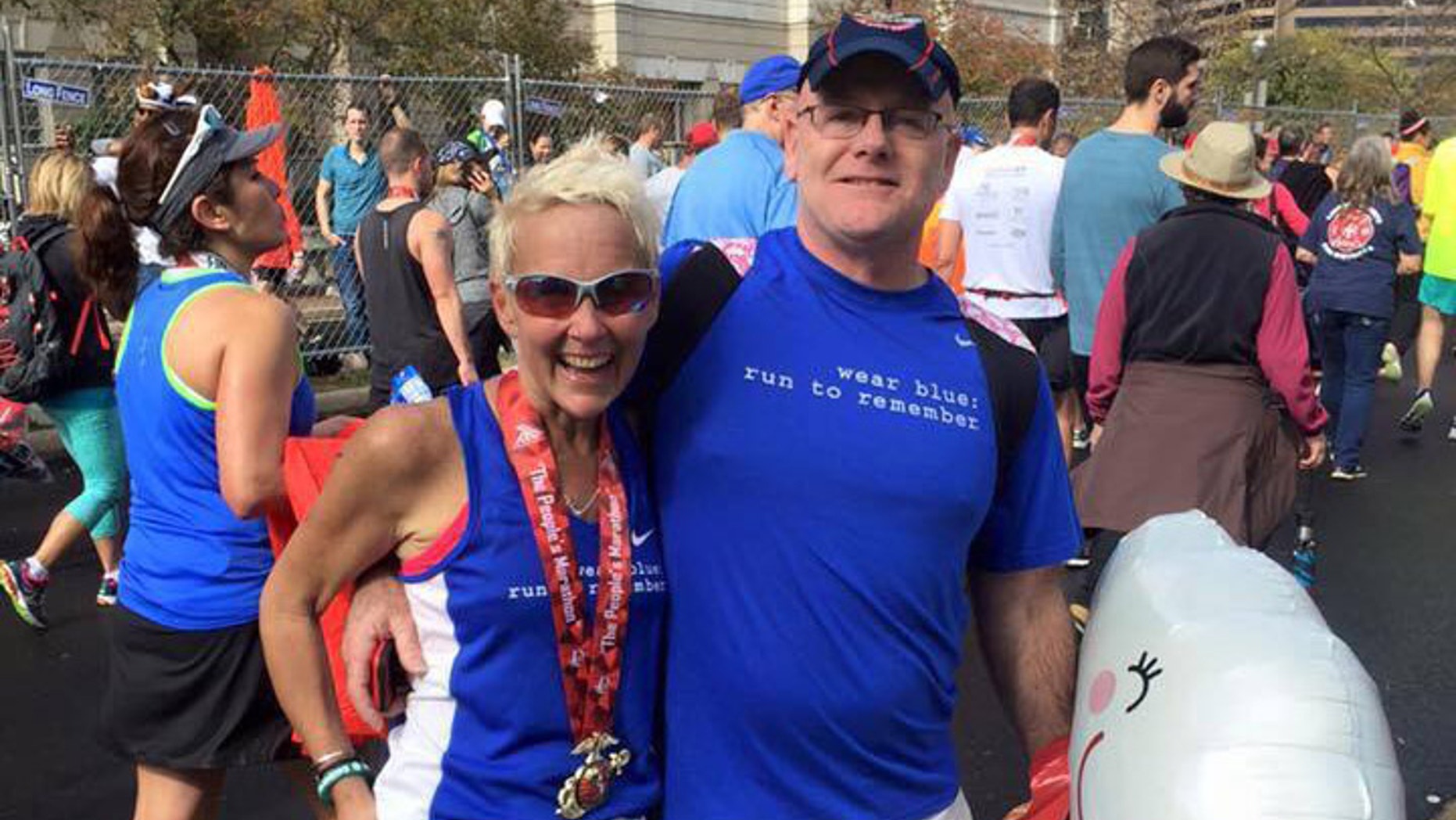 Kim Stemple and her husband, Jim, at the finish of the 2015 Marine Corps Marathon. (image courtesy Kim Stemple)
