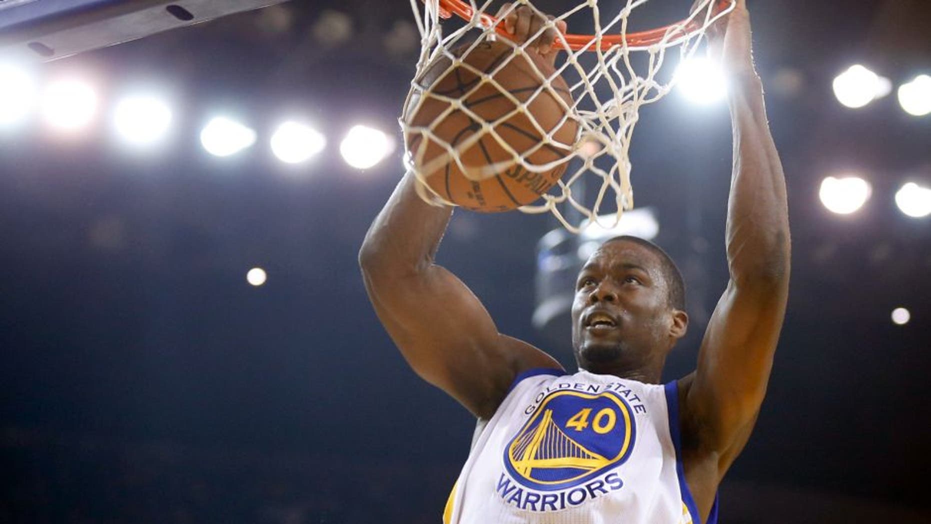 Dec 4, 2014; Oakland, CA, USA; Golden State Warriors forward Harrison Barnes (40) dunks the ball against the New Orleans Pelicans during the first quarter at Oracle Arena. Mandatory Credit: Kelley L Cox-USA TODAY Sports