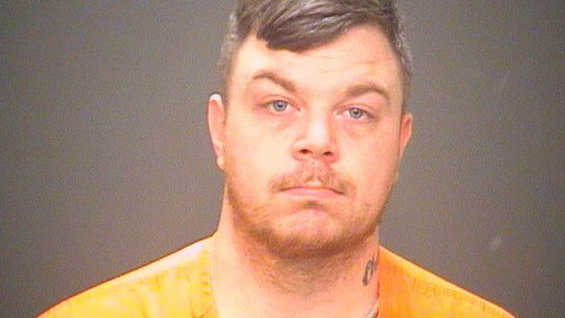 This undated photo provided by the Cuyahoga County Prosecutor's office shows Justin Christian.