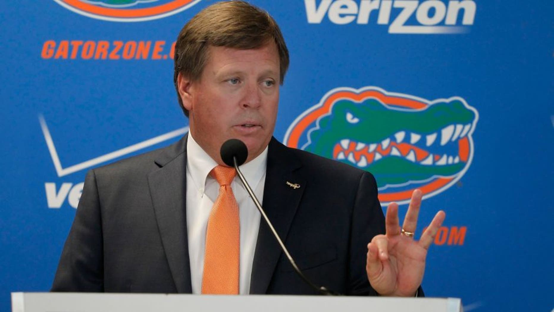 Dec 6, 2014; Gainesville, FL, USA; Florida Gators head coach Jim McElwain is introduced during a press conference at Ben Hill Griffin Stadium. Mandatory Credit: Kim Klement-USA TODAY Sports