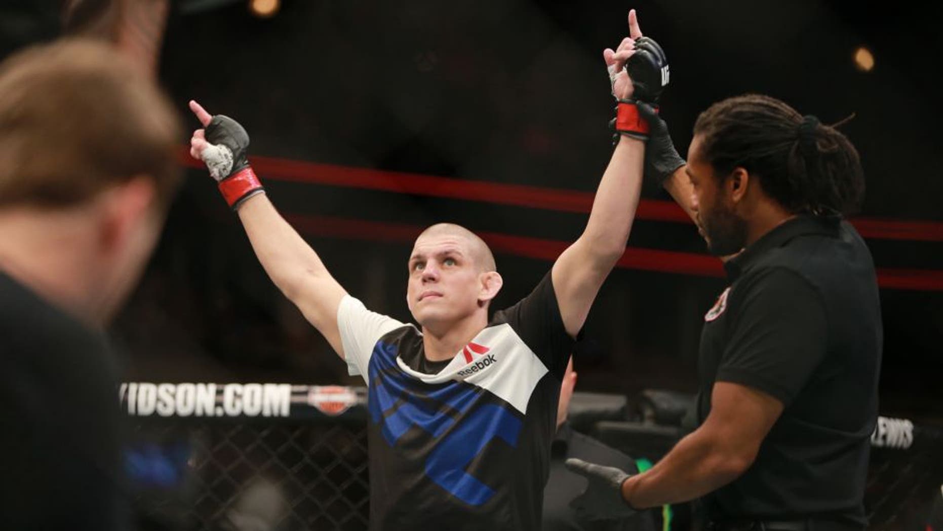 CHICAGO, IL - JULY 25: Joe Lauzon celebrates after defeating Takanori Gomi in their lightweight bout during the UFC event at the United Center on July 25, 2015 in Chicago, Illinois. (Photo by Rey Del Rio/Zuffa LLC/Zuffa LLC via Getty Images)
