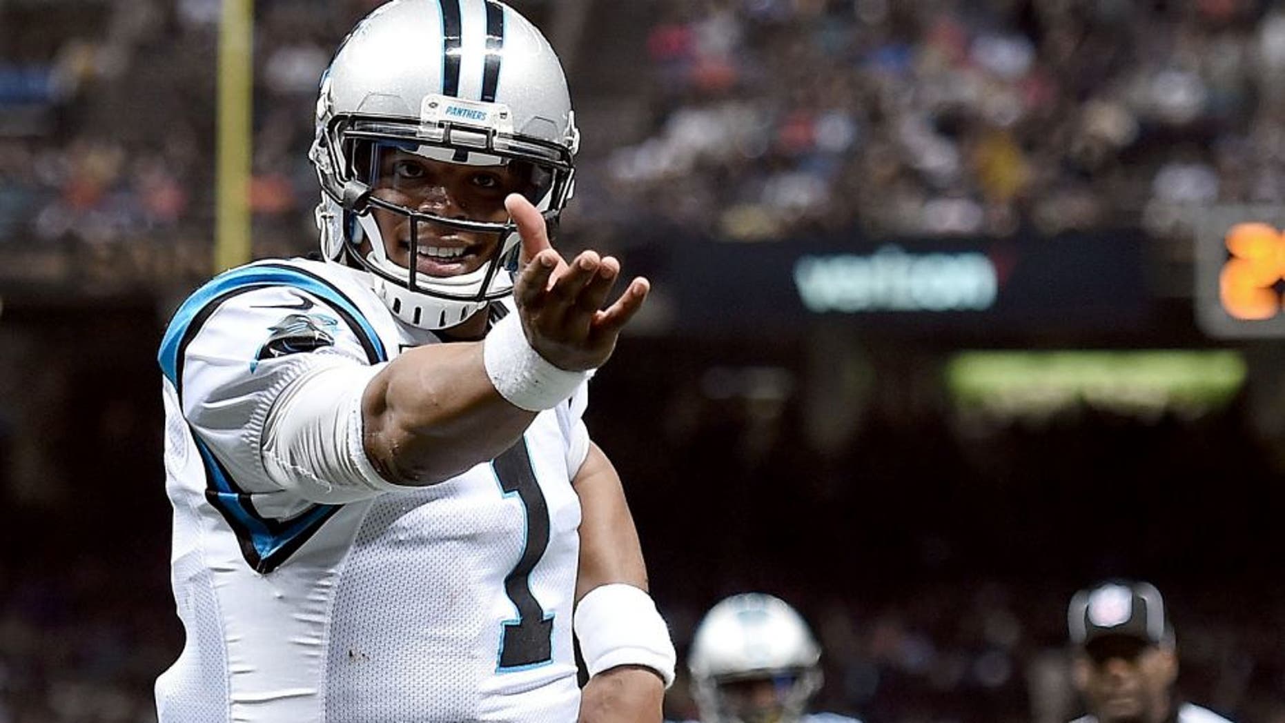 NEW ORLEANS, LA - DECEMBER 06: Cam Newton #1 of the Carolina Panthers celebrates a touchdown during the third quarter of a game against the New Orleans Saints at the Mercedes-Benz Superdome on December 6, 2015 in New Orleans, Louisiana. (Photo by Stacy Revere/Getty Images)