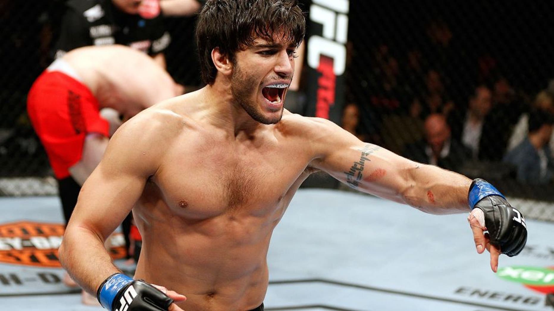 QUEBEC CITY, CANADA - APRIL 16: Elias Theodorou reacts after his TKO victory over Sheldon Wescott in their middleweight fight during the TUF Nations Finale at Colisee Pepsi on April 16, 2014 in Quebec City, Quebec, Canada. (Photo by Josh Hedges/Zuffa LLC/Zuffa LLC via Getty Images)